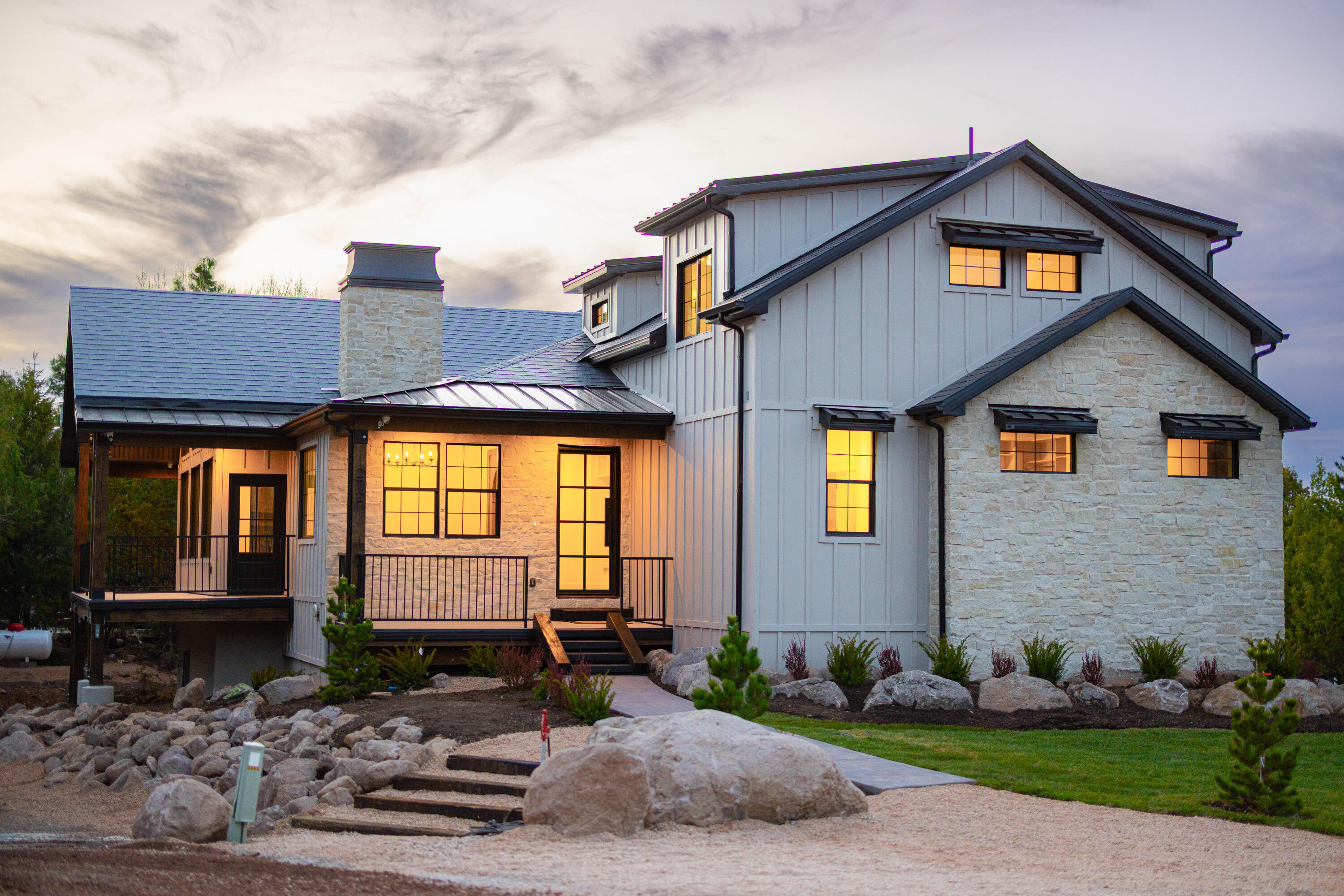 Luxury Mountain Living, Built to Last
Completed just one year ago, this exceptional custom home combines timeless mountain elegance with premium craftsmanship, high-performance construction, and modern comfort. This 4-bedroom, 3.5-bath retreat offers true main-level living with the primary suite, gourmet kitchen, laundry, and den all conveniently located on the main floor.
Designed well beyond standard construction, the home features 2x6 framing, premium insulation, a Class A Flame Spread Rating, and an aluminum shingle roof with a transferable 100-year warranty and engineered to withstand sustained 140 mph wind gusts. The exterior blends natural stone, stucco, and Hardie® board-and-batten siding for exceptional durability and timeless curb appeal.
Inside, enjoy luxury hardwood flooring, quartzite countertops, custom cabinetry, high-end appliances, a custom iron front door, leather-textured quartzite fireplace, oversized garage, tankless water heater, hot water recirculation system, and energy-efficient Low-E windows. 
Located on Dixie Power, with some of the lowest electric rates in the nation, this home offers remarkable efficiency along with the peaceful lifestyle Pine Valley is known for--cool mountain summers, quiet streets, abundant wildlife, and endless outdoor recreation.
A rare opportunity to own a thoughtfully engineered luxury mountain retreat built for generations to enjoy.