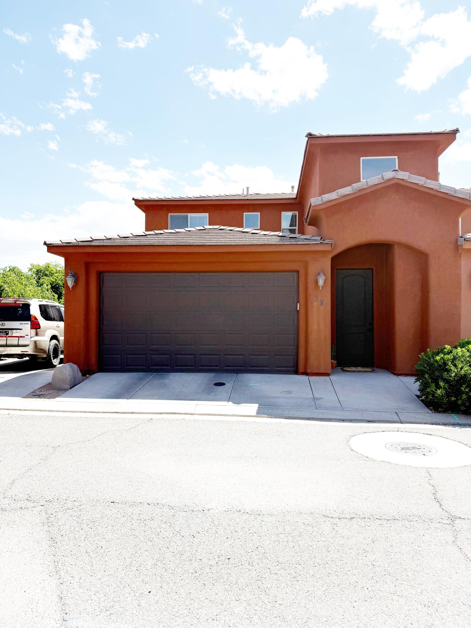 This amazing townhome features a grand entry and an ideal floor plan with a main-level primary suite complete with laundry in the master closet, plus an additional full laundry room upstairs for added convenience. Enjoy not one, but two spacious living areas including a loft upstairs, perfect for a second family room, office, or play space. Offering 4 bedrooms and 2.5 bathrooms, this home also includes upgraded cabinetry, granite countertops and stainless steel appliances. The fully landscaped and fenced yard provides private outdoor living, while the 2-car garage and additional third parking space on the side offer extra convenience and flexibility.
