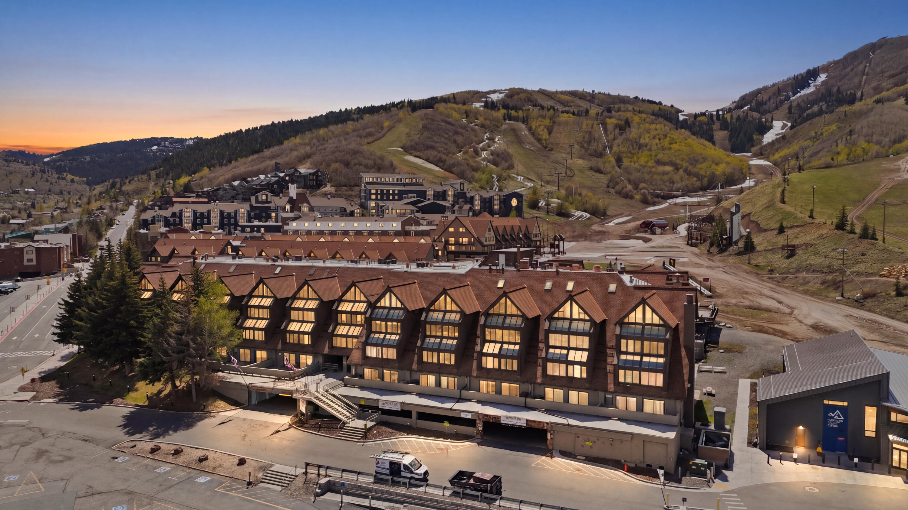 Located in the heart of Park City Mountain Village, this fully furnished and turn-key Resort Center condo offers an incredible opportunity to own at the base of Park City Mountain. With two bedrooms, two full bathrooms and 964 square feet, the residence is thoughtfully designed for comfort, convenience and year-round enjoyment.  The inviting great room is filled with natural light and features mountain-inspired finishes, a cozy fireplace and comfortable gathering space after a day on the slopes. The condo can sleep up to six guests and includes forced air, A/C, fresh new paint and a stackable washer and dryer for added convenience. One hall storage unit*, if available, provide additional space for skis, snowboards, gear and personal items.  Step outside and enjoy exceptional ski access, with the ability to ski out to First Time, 3 Kings or Eagle chair lifts and ski back in with a short walk to the unit. Resort Center places you directly among the energy of Park City Mountain Village, surrounded by restaurants, shopping, ski shops and gear rentals.  Owners and guests enjoy access to Resort Center amenities, including a gym, year-round heated pool and hot tub, along with one unassigned underground parking space. Ideally positioned near Old Town and just minutes from Main Street dining, shopping and entertainment, this property is equally appealing as a vacation home, second residence or investment property. Nightly and long-term rentals are allowed, with the option to use your own property manager.  From winter ice skating and world-class skiing to summer activities including the Mountain Coaster, Alpine Slide, ZipRider™, mini golf, climbing wall and mountain biking, this condo offers four-season Park City living in one of the area's most desirable resort locations.