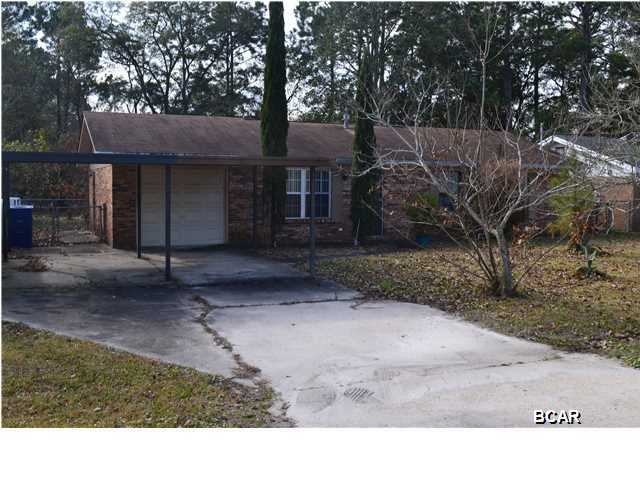Charming 3 bedroom, 2 bath home, which is centrally located to shopping, area attractions, and within minutes to the Gulf of Mexico and Tyndall Air Force Base. This Brick home has gone through some recent updates to include new carpet and paint in most rooms, and the home shows pride in ownership. As you walk through the front door you enter into the 14x14.5 living room. The kitchen area is to the back left of the home, with the breakfast area open to the living room and kitchen. The breakfast room features sliders to the 9.5x19 covered porch. The master bedroom has been added on to since 1992 making it 11.5x25, leaving you with more than enough room for your furniture. There is also a door from the master bedroom leading out to the backyard. The master bath was redone to include