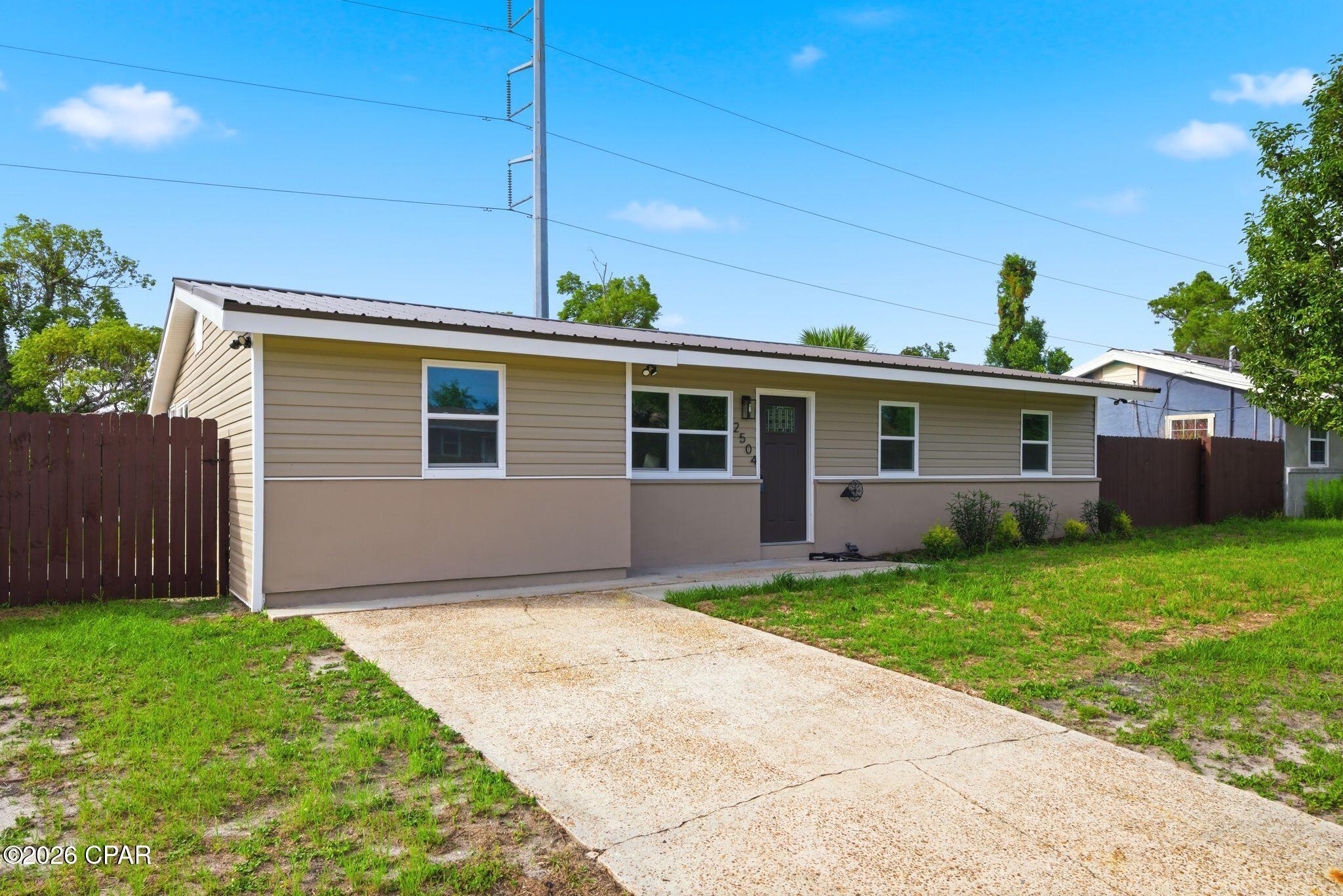 Fully remodeled and move-in ready, this beautifully updated 3-bedroom, 1-bath home offers a fresh, modern feel throughout. Featuring a brand-new kitchen with new appliances, new flooring, fresh interior paint, and numerous upgrades, this home feels practically brand new inside. The thoughtfully redesigned layout includes a spacious pantry and a separate laundry room for added convenience. Situated on a generously sized lot in a convenient Panama City location, this home is perfect for first-time buyers, investors, or anyone looking for a turnkey property ready for its next owner.