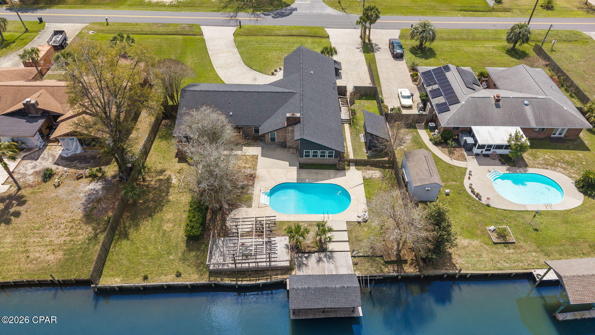 One level. One Owner. Built to be lived in and loved for generations. This WATERFRONT OPPORTUNITY now offers a brighter, more inviting feel. The interior enhancements complements the home's true coastal culture with a private pool, canal frontage, and a covered dock--perfect for fishing, boating, and unwinding by the water. Pack your picnic and head over to Shell Island. The residence features 4 bedrooms and 2.5 baths, including a flex room conveniently located just inside the entry from the drive-through garage, opening on both sides to create a porte-cochère style arrival and exit. No HOA This NorthShore waterfront home is ready for its next chapter and offers an exceptional opportunity along the Emerald Coast
(Buyer to verify all dimensions, measurements, fees & written information).

Top Features | Property Highlights
- Hidden panel Bosch dishwasher seamlessly integrated into the island for a sleek look and ultra-quiet performance
- Premium JennAir cooktop
- Brand new, never-used Samsung double-door microwave/convection oven
- Samsung refrigerator in like-new condition
- High-efficiency HVAC system
- New drywall with double insulation Top Features | Property Highlights
- Hidden panel Bosch dishwasher seamlessly integrated into the island for a sleek look and ultra-quiet performance
- Premium JennAir cooktop
- Brand new, never-used Samsung double-door microwave/convection oven
 - Samsung refrigerator in like-new condition
- High-efficiency HVAC system
- New drywall with double insulation