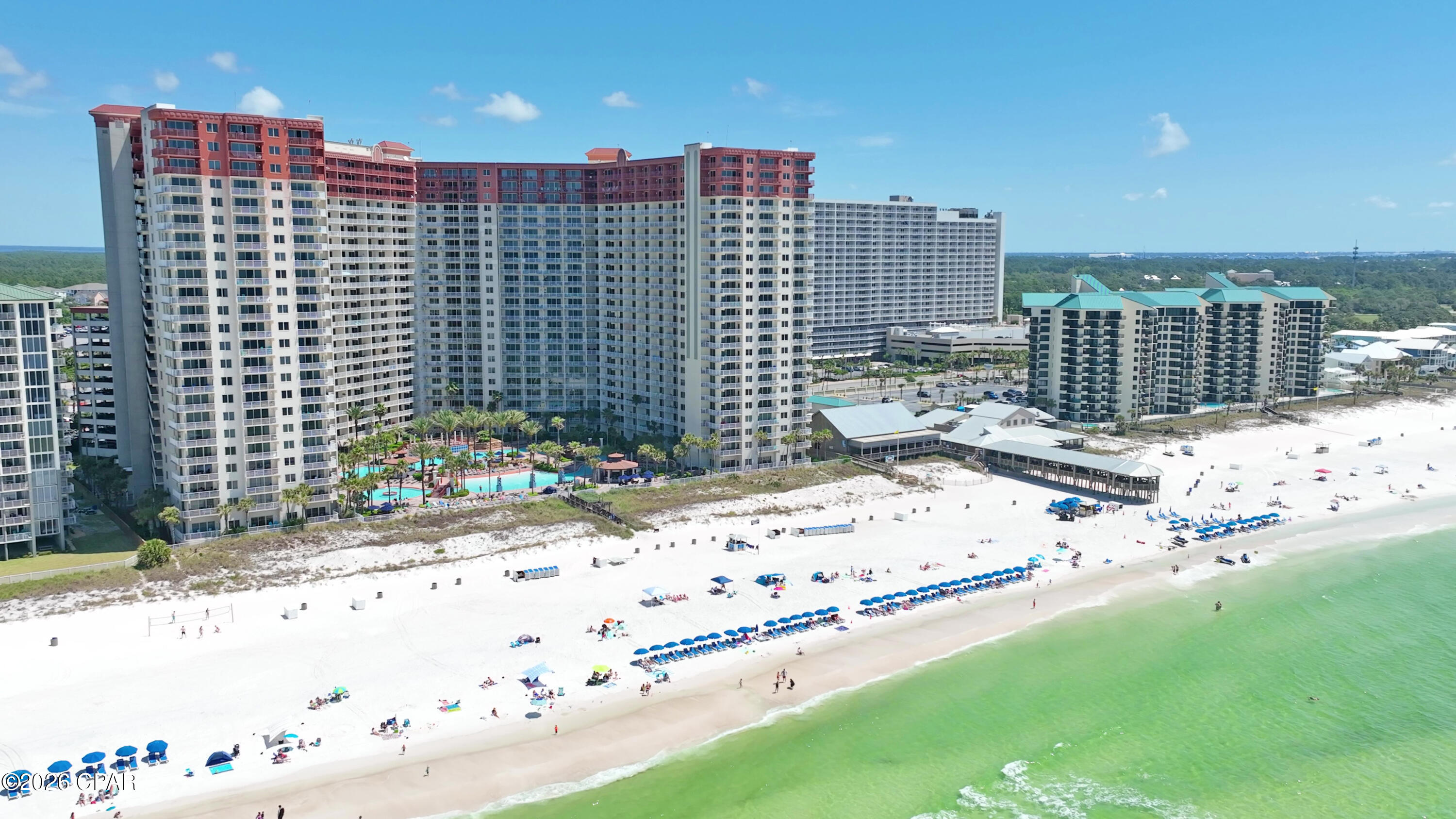 Seller financing is possible for this beautiful Shores of Panama condo, unit 1914. The Shores is the gem of the east side of Panama City Beach located next the famous Pineapple Willies, short walk to the brand new Tootsie's beachfront bar and grill with live music daily. Shopping, dinning, and entertainment are all within walking distance so guests do not need a car. The Shore's lagoon style pool is one of the best on the beach. There are many other amenities such as hot tub and exercise areas. This gated resort and security keeps you safe. Unit 1914 comes with a deeded garage space, 2 bedrooms, 2 bath  which is the perfect size for rentals. Fully furnished and rent ready for quick cash flow or just for your own private enjoyment. A must see.