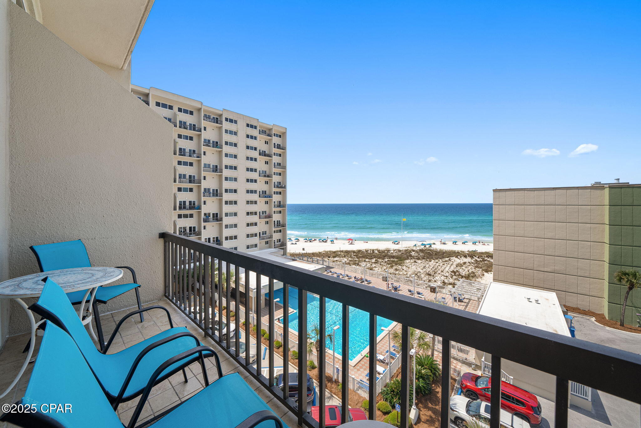 Welcome to an exceptional opportunity to own a stunning two-story condominium Pinnacle Port, located in the heart of Panama City Beach, Florida. This condo offers a harmonious blend of coastal and lakeside living, providing an unparalleled lifestyle experience.

Upon entering the condo, you are greeted by a spacious living area that seamlessly flows into a Gulf-front balcony, offering breathtaking views of the pristine waters. The main level features a well-appointed kitchen, designed for both functionality and style, making it ideal for entertaining guests or enjoying a quiet evening at home.

The upper level houses two generously sized bedrooms, each offering unique views. The guest bedroom provides captivating vistas of the Gulf, while the master bedroom features a private balcony overlooking the serene waters of Lake Powell. This thoughtful layout ensures privacy and comfort, enhancing the living experience.

Residents of this exclusive community enjoy a host of amenities designed to enrich their lifestyle. The 24/7 gated community ensures security and peace of mind, while the fitness center caters to your health and wellness needs. For sports enthusiasts, the pickleball court, playground, and basketball court offer ample opportunities for recreation. The boat dock and launch, along with a fishing pier, provide direct access to Lake Powell, perfect for canoeing and fishing enthusiasts.

Located just minutes away from the vibrant 30A corridor, this property offers convenient access to a variety of attractions and entertainment options. A short drive will take you to Pier Park, where exciting new attractions such as the Dolly Pirate Show and Top Golf are set to open in June. Additionally, the nearby Shops at Carillon offer a delightful shopping experience, while the summer concerts in the park at Carillon provide cultural enrichment and entertainment.

This condominium represents the best of both worlds, combining the tranquility of lakeside living with the excitement of Gulf views. Whether you are seeking a permanent residence or a vacation retreat, this property offers an unparalleled opportunity to experience the beauty and lifestyle of Panama City Beach.

Don't miss the chance to make this exceptional property your own.