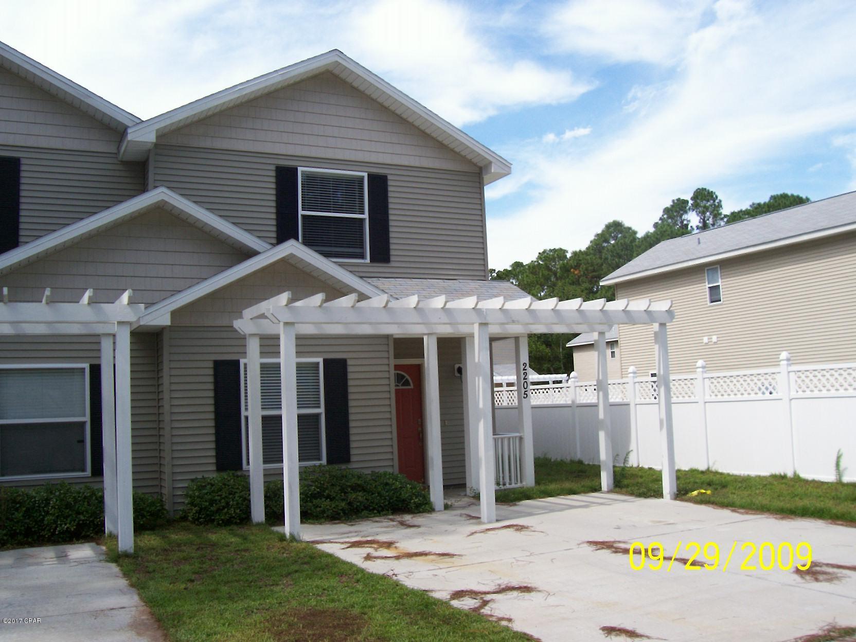 This is a 3 bedroom 2 bath town home located in central Panama City Beach. Just a short distance to the Navy Base and Beach. This unit features one spare bedroom downstairs, 2 upstairs to include the master, and a small fenced yard.