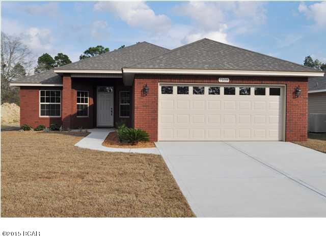 Beautiful two year old brick and vinyl home in nice area of Southport, just minutes from Lynn Haven. As you enter the foyer, you will see a beautifully tiled foyer. The living area boasts 10 foot ceilings with fan and recessed lighting. A set of French doors with integrated mini-blinds opens onto the covered porch area and into the spacious back yard. The kitchen features all wood maple cabinets, granite-look countertops and breakfast bar, stainless steel appliances and  large pantry area. The dining room provides an informal space. The utility room is conveniently located near 3 of the bedrooms. The two car garage features a 130MPH wind rated garage door with opener and two remotes. The master bedroom offers 9 foot boxed ceiling, ceiling fan, large walk-in closet, and dual vanities Beautiful two year old brick and vinyl home in nice area of Southport, just minutes from Lynn Haven. As you enter the foyer, you will see a beautifully tiled foyer. The living area boasts 10 foot ceilings with fan and recessed lighting. A set of French doors with integrated mini-blinds opens onto the covered porch area and into the spacious back yard. The kitchen features all wood maple cabinets, granite-look countertops and breakfast bar, stainless steel appliances. The dining room provides an informal space. The utility room is conveniently located near 3 of the bedrooms large pantry area. The two car garage features a 130MPH wind rated garage door with opener and two remotes. The master bedroom offers 9 foot boxed ceiling, ceiling fan, large walk-in closet, and dual vanities with 

granite-look countertops in the bath. The three additional bedrooms feature ceiling fans, ample closet storage and share the hall bath. Other upgrades include a stunning lighting package, crown moulding in the living area, double paned windows, and oil-rubbed bronze door hardware.