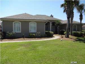 Completely updated beautiful golf course home. This three bedroom 2.5 bath has all you are looking for. Gourmet kitchen with top of the line stainless steel appliances ,double oven, propane cooktop and custom cabinetry Open and inviting floor plan great for entertaining and enjoying the wonderful golf course views. Master suite has patio access, a spacious bathroom and closet with custom shelving. Garage is oversized with plenty of space for additional storage. The patio is a combination of covered, enclosed and screened area to create your personal resort experience surrounded by beautiful landscaping, pool that is heated and a hot tub. The home has a sprinkler system, water purification system, a new roof, 2013, with a transferrable warranty and there is a termite bond on home that