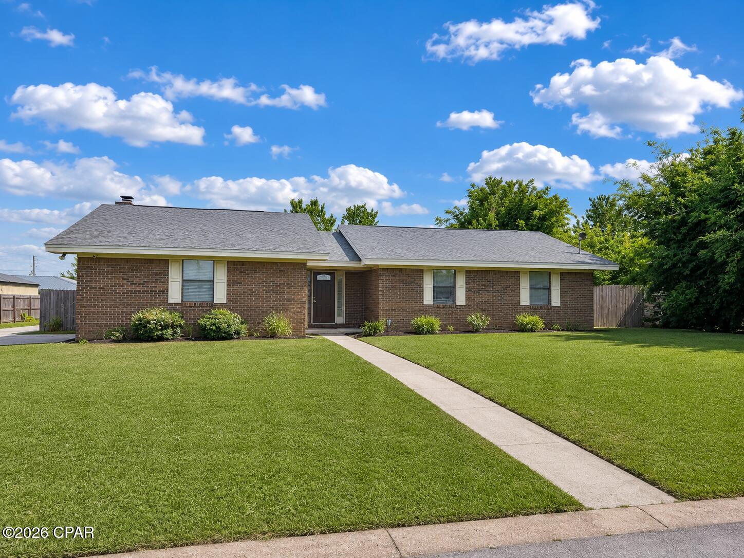 Welcome to 618 Gabriel Street, a spacious 3-bedroom, 2-bathroom home offering approximately 1,960 square feet of comfortable living space in a convenient Panama City location.

Inside, you'll find a bright and open layout with luxury vinyl plank flooring throughout most of the home. The kitchen features white cabinetry, granite countertops, a stainless steel refrigerator, a built-in wall oven, and plenty of cabinet and counter space.

The large living area offers vaulted ceilings, a ceiling fan, and a charming fireplace that creates a warm and inviting focal point. French doors provide access to the backyard, while the adjoining living and dining areas offer plenty of flexibility for entertaining, relaxing, or creating a home office.

The spacious primary bedroom includes a large walk-in closet and a private bathroom with an oversized walk-in shower and grab bars. Two additional bedrooms offer generous closet space, and a second full bathroom serves the additional bedrooms and guests.

Additional features include:

* Fresh interior paint
* Luxury vinyl plank flooring throughout most of the home
* Kitchen with granite countertops
* Stainless steel refrigerator and built-in oven
* Spacious living room with fireplace
* Vaulted ceilings and ceiling fans
* Large primary bedroom with walk-in closet
* Primary bathroom with oversized walk-in shower
* One-car garage
* Large driveway with additional parking pads
* Partially fenced backyard
* Convenient access to shopping, restaurants, the Navy base, Tyndall Air Force Base, and area beaches

This move-in-ready home offers plenty of space, convenient parking, and a central location close to many of Panama City's everyday amenities.

Address: 618 Gabriel Street, Panama City, FL 32405
Bedrooms: 3
Bathrooms: 2
Square footage: Approximately 1,960