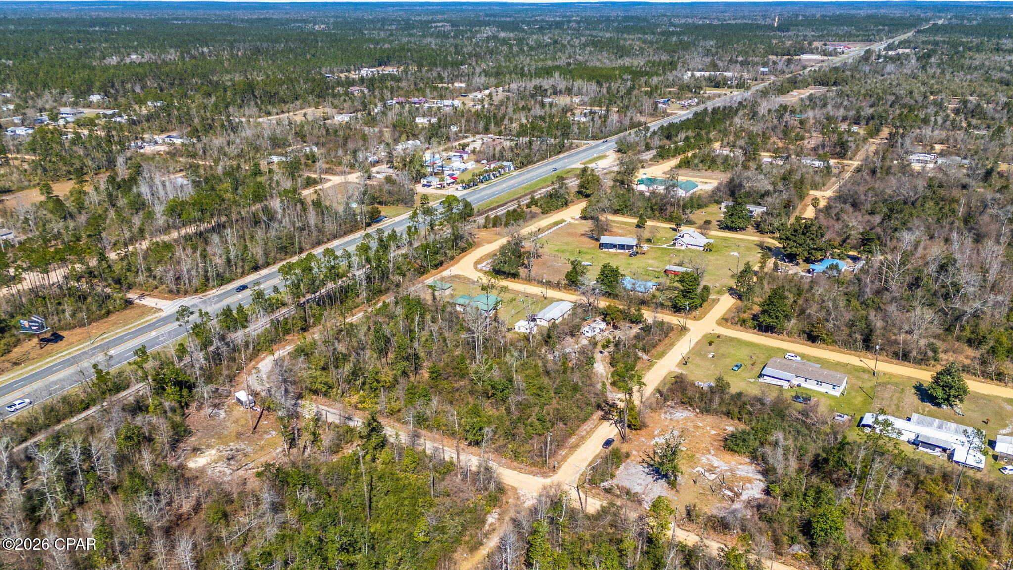 If you've been searching for an affordable homesite with convenient access and a peaceful setting, this parcel on 1st St in Fountain offers a great opportunity. Surrounded by natural tree coverage and neighboring homesites, the property provides a quiet environment with flexibility to build your future residence, place a manufactured home (buyer to verify), or hold as an investment.

Located just off Hwy 231, the property offers an easy commute to Panama City while still enjoying the privacy and slower pace of country living. The Fountain area is known for its spacious lots, wooded surroundings, and growing appeal among buyers seeking affordability, flexibility, and room to spread out.

Buyer to perform all due diligence regarding utilities, zoning, land use, access, and property suitability for intended use.