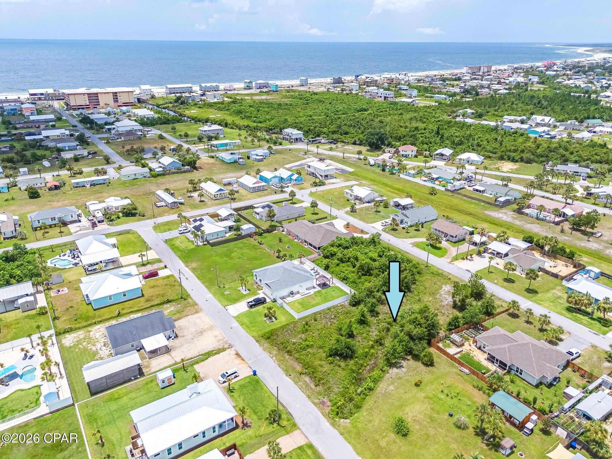 Build your dream coastal home on this prime 0.37-acre lot in the heart of Mexico Beach! One of the larger residential lots in the area, 407 California Drive offers ample space for a custom home or modular build with water and electric already in place. Enjoy a peaceful setting just a short walk or golf cart ride to the beach, local restaurants, and shops. Whether you're looking for a full-time residence, vacation getaway, or investment opportunity, this ready-to-build property offers an excellent opportunity to enjoy the best of Mexico Beach living. Property includes a 20-foot city drainage easement centered on the drainage ditch in the back right corner of the lot.