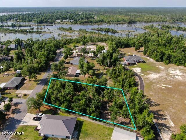 Check out this beautiful wooded lot within walking distance to Cherokee Landing boat ramp and deer point lake. Sitting at over half an acre this lot is perfect for your new home. The lot is in flood zone ''X'' and is high and dry. Located in the quiet Wedgewood neighborhood with underground power and no HOA. Seller is acting as the listing agent.