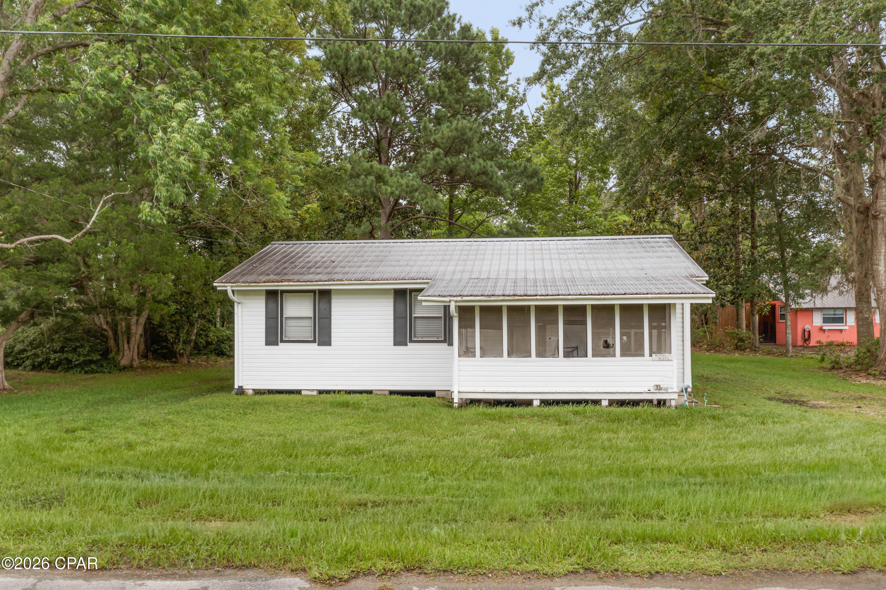 Step into classic Florida charm with this 4-bedroom, 2-bath vintage cottage perfectly perched on high elevation along beautiful Holmes Creek. This inviting home blends character, comfort, and an unbeatable location right in the center of town, offering both convenience and a peaceful waterfront lifestyle.

Enjoy mornings on the creek, afternoons exploring nearby parks, and evenings soaking in the quiet of rural Florida living. With easy access to local schools, shopping, and everyday essentials, this property is ideal for full-time living, a weekend retreat, or a family getaway.

Outdoor lovers will appreciate being just minutes from Holmes Creek's crystal-clear waters, known for canoeing, kayaking, swimming, and diving. And when you're ready for a day on the coast, it's a short, easy drive to the Gulf of America's white-sandy beaches, where endless water activities, dining, and entertainment await.

A rare opportunity to own a true Florida cottage with room to grow, room to gather, and a lifestyle that's hard to match.