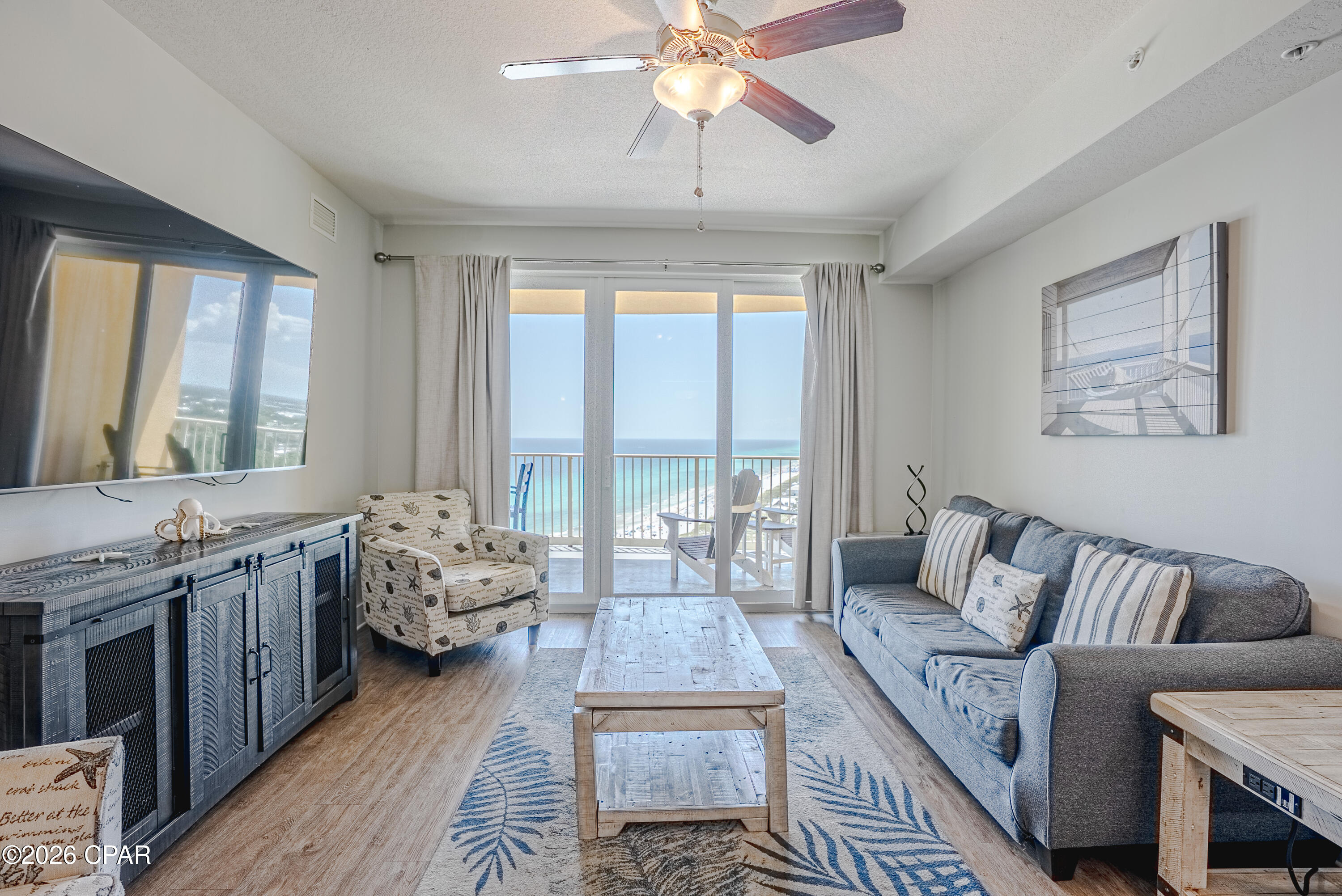 This unit is located in a high floor that offers a very wide-angle view.  
Experience refined coastal living in this impeccable 3-bedroom, 2-bath unit in Calypso Tower III, ideally situated on the 21st floor with sweeping, unobstructed views of the Gulf of America. This exceptional unit was originally customized for the developer, offering a rare and distinctive decor not found elsewhere in the building.
Designed with sophistication in mind, the interior features custom shiplap detailing throughout the entry, hallway, kitchen, and living area--blending modern elegance with timeless coastal charm. The gourmet kitchen is appointed with quartz countertops, stainless steel appliances, and a bespoke built-in dry bar/storage.
Step onto the expansive private balcony and indulge in true indoor-outdoor living while taking in breathtaking Gulf sunsets. Offered fully furnished with curated, high-quality décor, this unit is completely turnkey-ideal as a luxury second home or a high-performing investment property.

Unit Highlights:
3BR / 2BA - strong rental layout
9th-floor elevation with Gulf views
Oversized balcony
Quartz countertops + upgraded finishes
Built-in dry bar and extra storage
Fully furnished / turnkey
Resort Amenities Include:
Lagoon-style pool
Hot tub
Cabanas & tiki bar
Fitness center
Covered parking & easy beach access
Located just steps from Pier Park shopping, dining, and entertainment, this property offers excellent short-term rental potential and strong investment value.
Schedule your private showing today, this one stands out from the rest.
