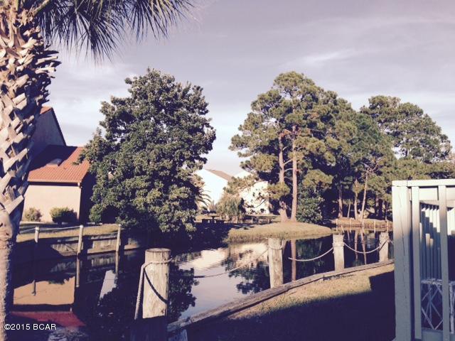 Recently redone & updated townhouse within walking distance of the sugar sand beach & emerald gulf. New Stainless appliances. New granite countertops. New tile flooring.Freshly painted. Beautifully decorated in the latest tones & style. Located on the canal with a pleasing & peaceful view. Move in ready. Great opportunity for resort rental or a vacation home.  

Estate Property. All sizes are approximate & should be verified if important.