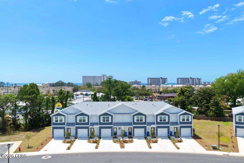 This 3 BR, 2.5 Bath attached unit is within half a mile from the beach! Built in 2025, check out this corner unit boasting more square footage than interior units.  Enjoy the one car garage for any purpose, but get prepared for loving the location. The GLADES neighborhood has several entrances and exits, making commute time a breeze with these options. This is priced so that you could afford to invest in a permanent residence, a second  home for vacations, or a rental investment. Short term rentals are also allowed if you want some income to offset your expenses.