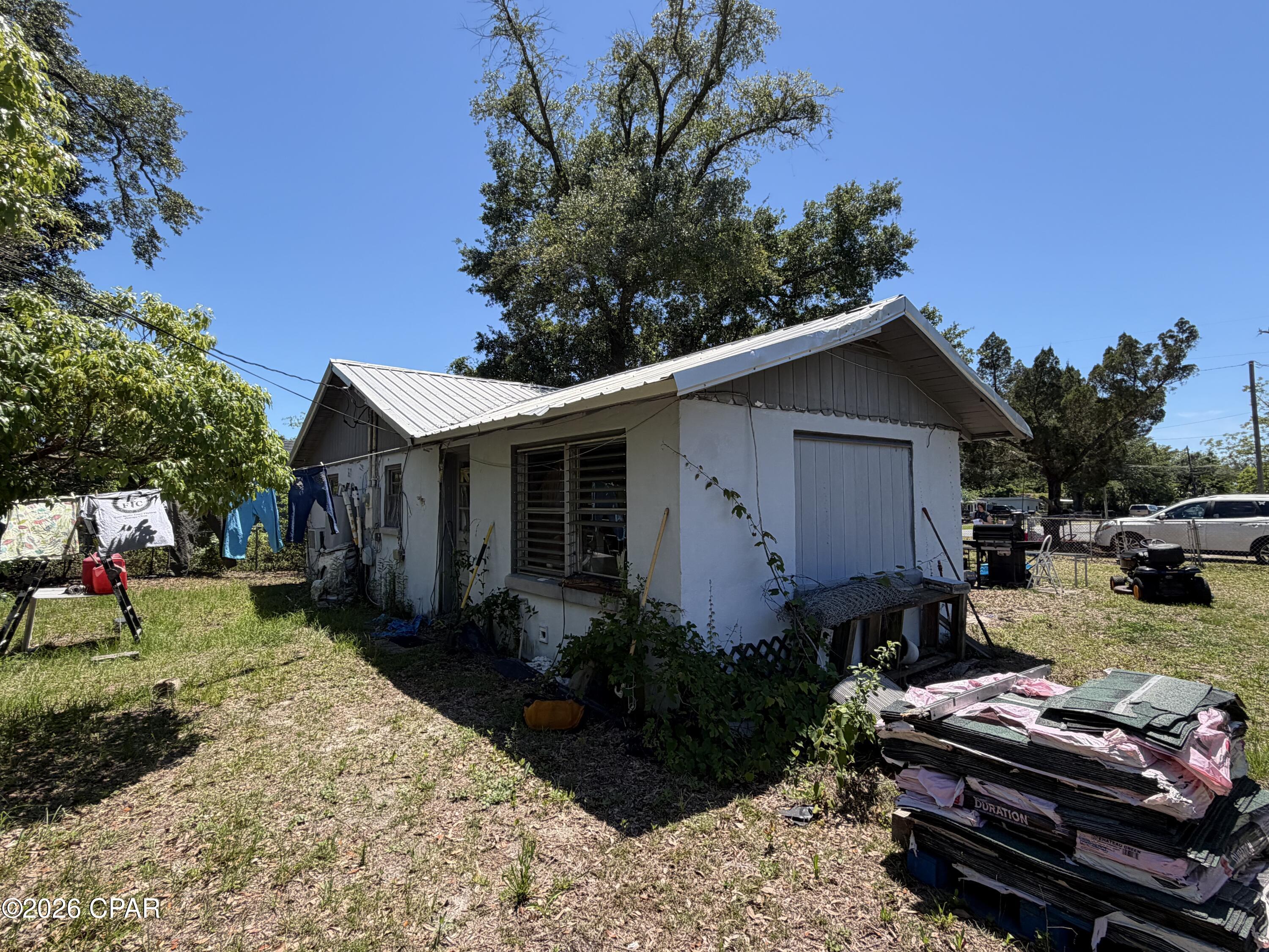 Build your vision on this amazing nearly half-acre, double lot property at 808 Detroit Ave in Panama City! Nestled beneath beautiful mature trees, this spacious lot offers endless potential in a convenient location close to schools, shopping, dining, and everyday amenities. Just approximately 15 minutes from the sugar-white sands of Panama City Beach and about 30 minutes from Mexico Beach, you'll enjoy easy access to some of the Gulf Coast's most loved destinations.

The existing home will need significant TLC, but for the right buyer, this property presents an incredible opportunity to renovate, rebuild, or create something truly special. With plenty of space, gorgeous trees, and a desirable location, the possibilities here are wide open!