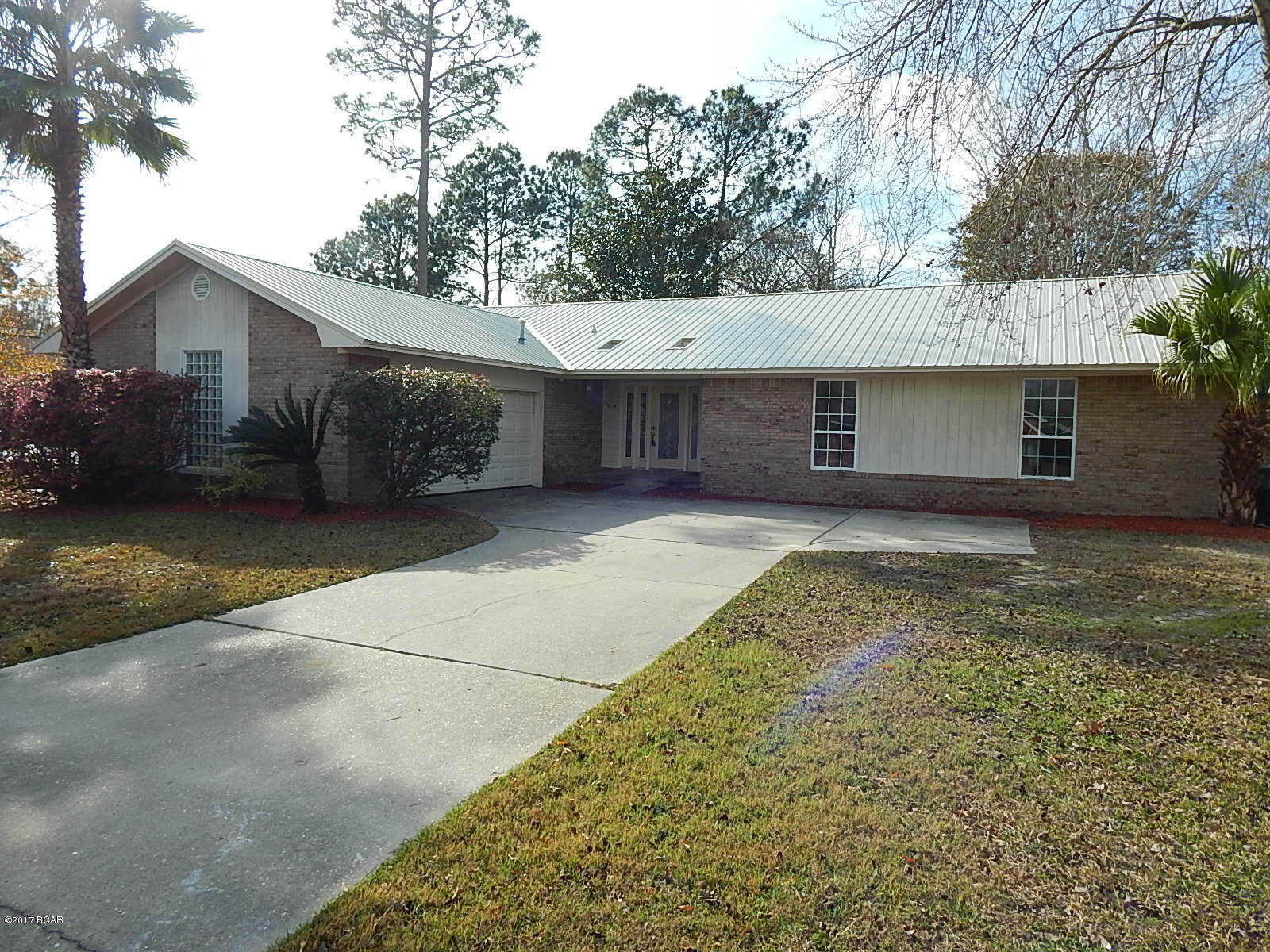 Centrally located, Just remodeled, brick Lynn Haven home located on large fenced lot. NEW ROOF, NEW PAINT, NEW CARPETS. Lots of work just completed on this home that is a easy commute to NSA base, shopping and the top rated school system Lynn Haven is known for. This home has a open floor plan,Vaulted Ceilings,wood burning fireplace, formal dining room, and large open Living Area. Nice Large kitchen with lots of cabinets that were just painted, SS appliances, and separate breakfast area. Large side entry garage entrance right into the kitchen area for easy unloading of groceries. Even the garage got a facelift. Lots space just waiting for your creative touches. Large Master bedroom with dressing area, HERS Walk-in Closet and a smaller HIS closet.
