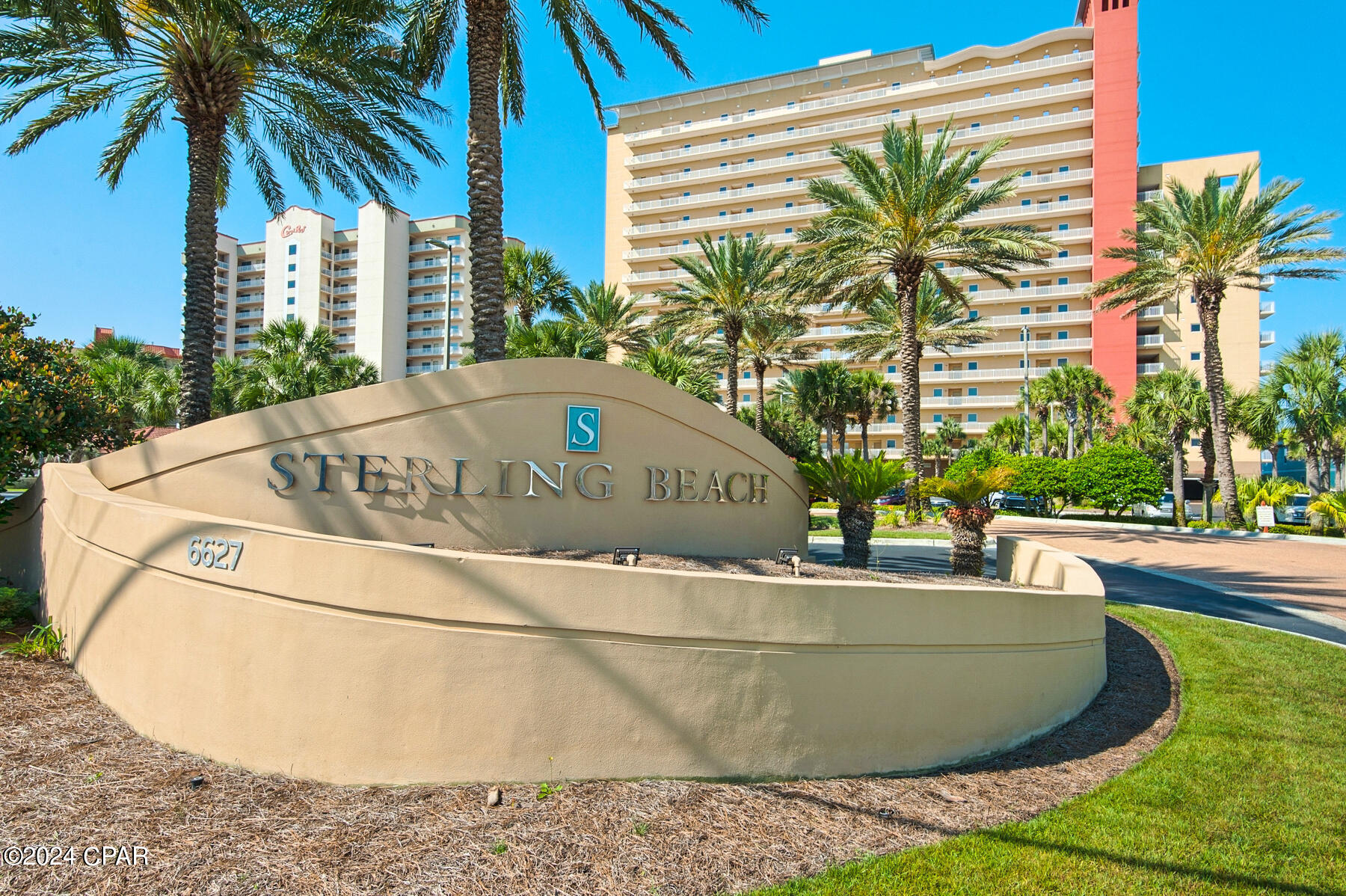 Luxurious beachfront condominium at Sterling Beach offering unparalleled views of the Gulf of Mexico. This tastefully designed unit features two gulf front master suites featuring walk-in closet, jacuzzi tub and a separate shower, spacious living area with gas fireplace, high ceilings and floor-to-ceiling windows that provide the interior in natural light. With over 2,300 sq.ft., three bedrooms, three full baths, and modern amenities, this retreat provides a perfect blend of comfort and style.  Enjoy the view from the fully equipped kitchen with quartz countertops. There are two private balconies overlooking The World's Most Beautiful Beaches. Whether you're savoring breathtaking sunsets or enjoying the resort-style amenities, Sterling Beach Unit 1601 promises an idyllic beachfront escape. Luxury amenities include an onsite theatre, 4,000 sq.ft. gulf front resort pool, BBQ picnic area with grills, a community room, fitness center and 350 feet on the Gulf of Mexico.