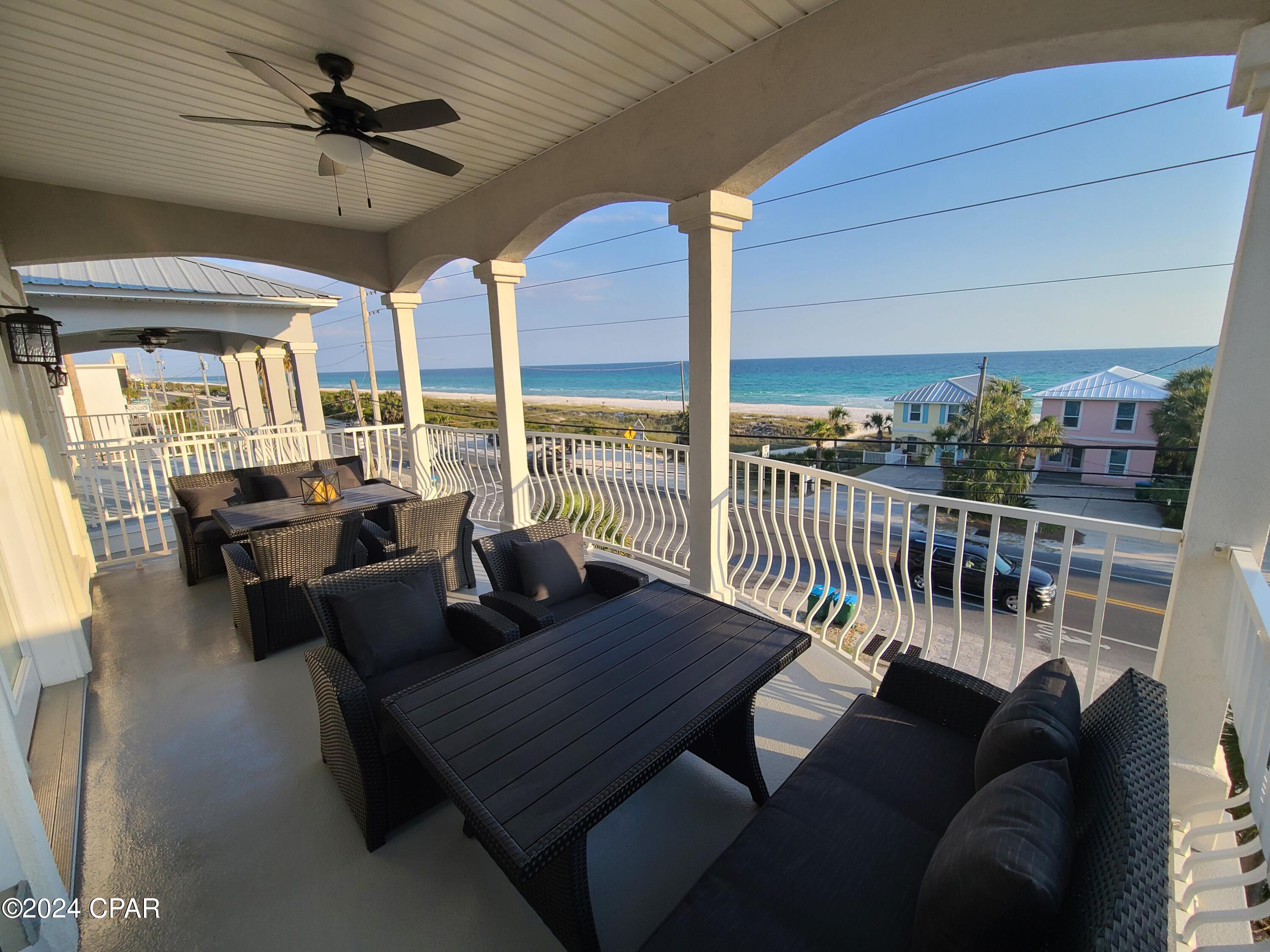 Welcome to the captivating white sandy beaches of Panama City Beach, Florida!! This exquisite one owner 3 story, 5 bedroom/5 bath beach house has been a revered family getaway since 2016. Come see the alluring views and enjoy the warm, inviting designer finishes that this fully furnished front beach property offers. It features solid wood cabinetry, leathered granite surfaces, all stainless appliances, & a large elevator for bringing up groceries or helping those who are physically challenged. It has an on-demand tankless gas water heater and a security system. The dishwasher, microwave, & stove have been replaced within the past 3 years. Smaller A/C unit was replaced last year. Parking for 2 cars in the oversized attached garage, 4 cars in the driveway and plenty of parking on the adjacent beach roadside allows for large holiday gatherings. Both large balconies (210 sq. ft.) offer amazing sunset views of the Gulf of Mexico! This property was utilized as a vacation rental in the past 3 years and netted over $80K in its first year. RENTAL SALES & PROJECTION REPORTS AVAILABLE. Whether you're looking for a primary, secondary, or an investment property, this home will exceed your expectations. PRICED TO SELL!! It won't be available for long. We will need a 24-72 hour notice to show this property. Listing agent's husband built this property.