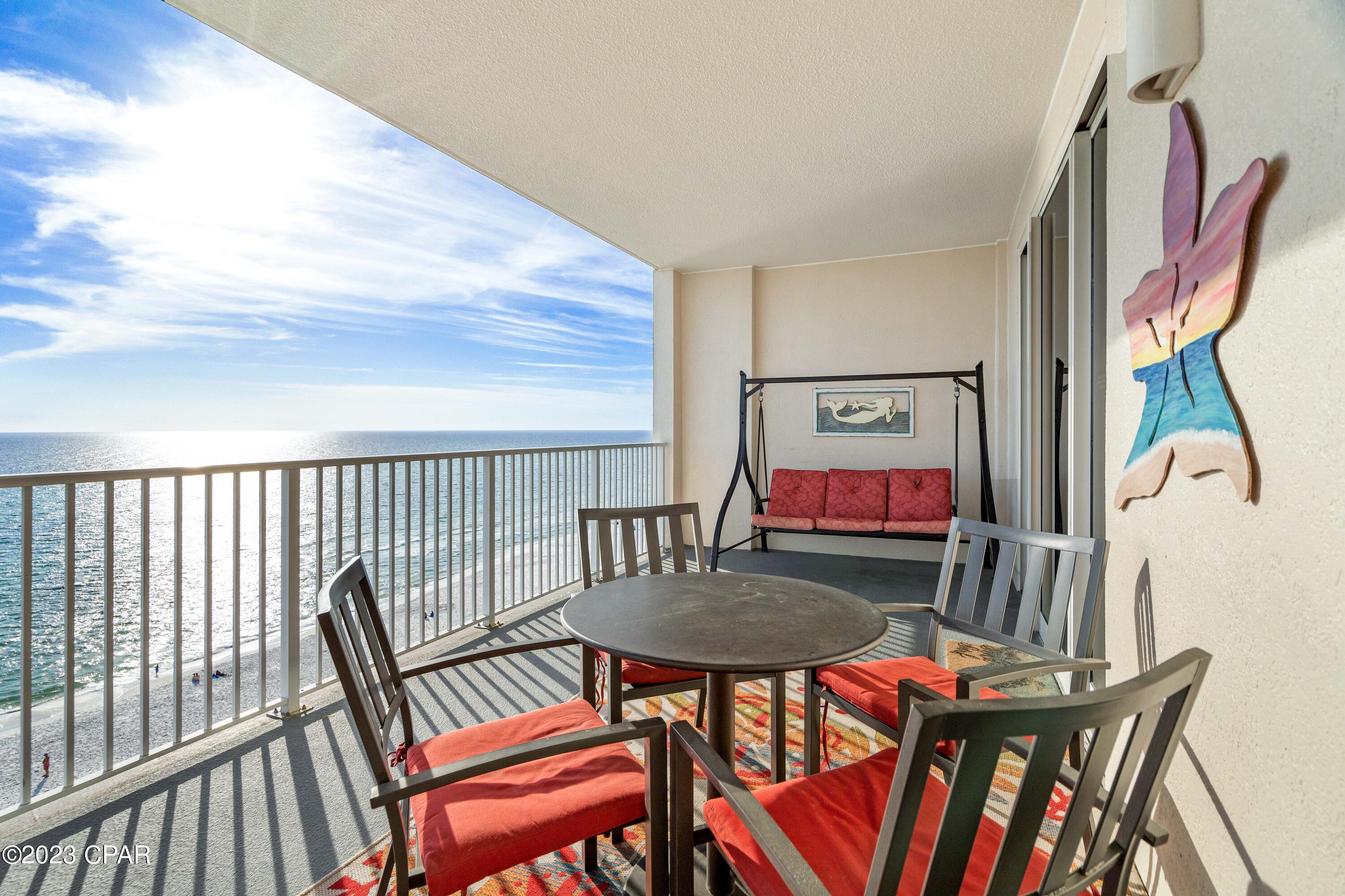 **Back on market at no fault of sellers after 35 days off market in escrow. Great opportunity to jump on it just in time for peak Summer!**  Welcome to Ocean Reef on the popular West end of Panama City Beach, Florida! This spacious 2 bedroom, 2 bathroom offers plenty of space for the whole family and boasts an amazing balcony with incredible views as well as a deeded, covered parking space in the garage below! This property has been lovingly cared for offering several upgrades and is sold completely turn-key and ready to go for the rental season! Spacious living, incredible views, on-site amenities and great rental potential make this an excellent property for anyone looking for a condo ON the beach. Amenities include a Gulf front pool, a heated indoor pool, hot tub, steam room and sauna, fitness room, beautiful landscaping, covered parking beneath the building and over 330' of beach!