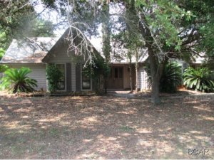 4BR 2BA home on a large corner lot. The home has a large living room with a fireplace and cathedral ceilings and the kitchen has a breakfast bar. The home also features a privacy fenced backyard with an in-ground pool and an oversized 2 car garage. Pets Negotiable!