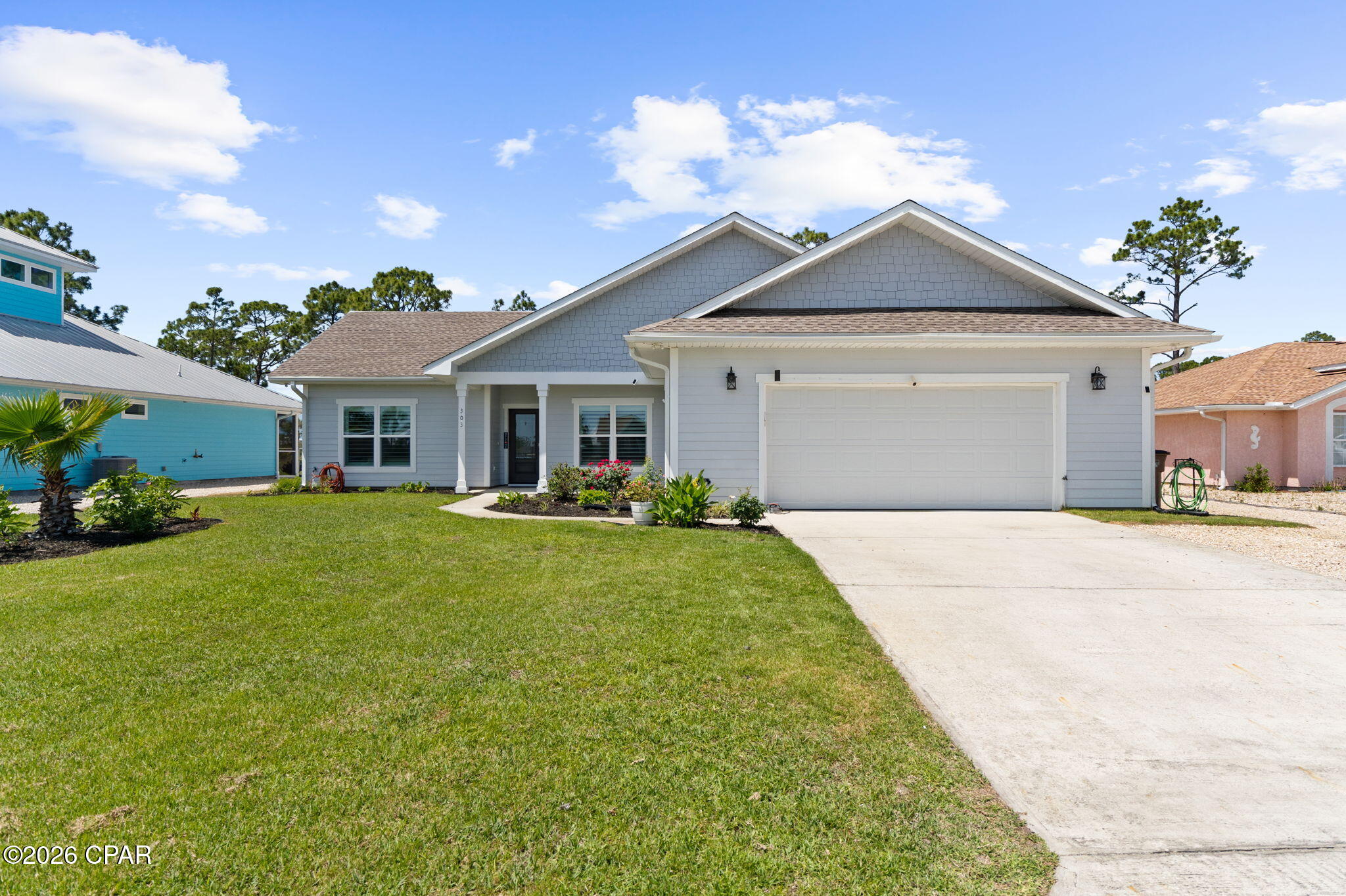 COASTAL LIVNG ELEVATED!! 303 Nautilus is a beautifully crafted coastal retreat tucked in the SeaShores community in St Joe Beach. This thoughtfully designed one-level home with 3 bedrooms/2.5 baths & an office/flex space that can serve as a 4th bedroom. From the moment you arrive, the coastal vibe with new plantation shutters sets the tone for what's inside. Inside, a bright, open-concept layout where natural light pours into the living, dining & kitchen areas, creating a warm, inviting atmosphere perfect for gathering with family & friends. The kitchen features a large island with breakfast bar seating, modern appliances, pantry storage & plenty of prep space- ideal for hosting gatherings or casual beachside meals. The split floor plan offers privacy, with a spacious primary suite designed for unwinding, while guest bedrooms provide ample room for visitors or rental guests. The garage has been converted into a climate-controlled workshop, ideal for hobbies or future customization. Step out back to a landscaped porch area perfect for morning coffee or evening gatherings, all while enjoying coastal breezes. This oversized lot provides plenty of room to add a pool, create an outdoor entertaining area or simply enjoy the extra space & privacy that's hard to find this close to the Gulf. The property also offers ample space for boat or RV parking along the side of the home, complete with a 50 amp electric service for easy hookup--perfect for coastal living & weekend adventures. With the beach just moments away, you're never far from the sugar-white sands & emerald waters of the Gulf. Embrace the lifestyle that makes this area so special--spend your days fishing, boating, paddleboarding or simply relaxing by the water. Hop on your golf cart & explore everything Mexico Beach & Port St Joe have to offer, from boutique shopping & local restaurants to live music, marina access & year-round community events. Whether you're searching for a full-time residence, a 2nd home or an income-producing investment, this property delivers the perfect combination of space, style & location along the Forgotten Coast. Call for your private tour & LIVE THE BEACH LIFE!!