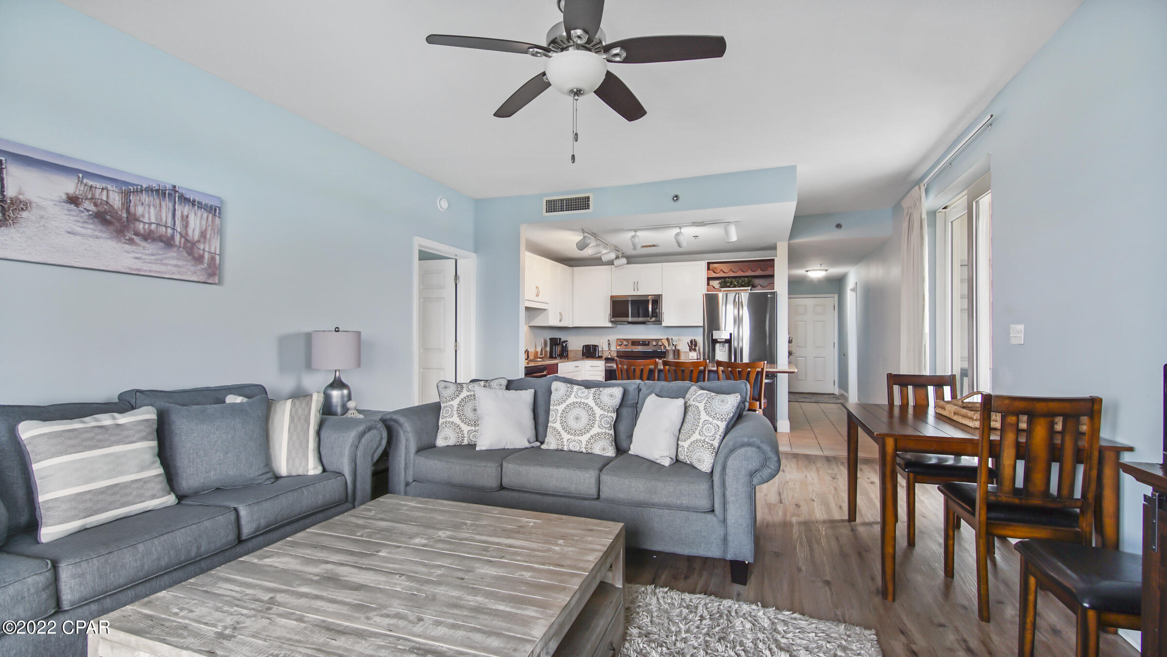 Welcome to your personal slice of paradise. This spacious unit has an open floorplan that has been beautifully updated with vinyl flooring, new appliances, custom paint that makes this condo pop! In addition to the bedrooms, the bunk beds and sleeper sofa add sleeping space for even more guests to enjoy all that Laketown Wharf has to offer. You will have access to all the Laketown's amenities which include: 5 Pools, 2 Hot Tubs, a gym, The Boardwalk, a nightly lightshow on the lake, shopping, restaurants, and more. You will be steps away from the Beach Accesses located next to Pineapple Willys and a short walk from multiple other attractions PCB has to offer!