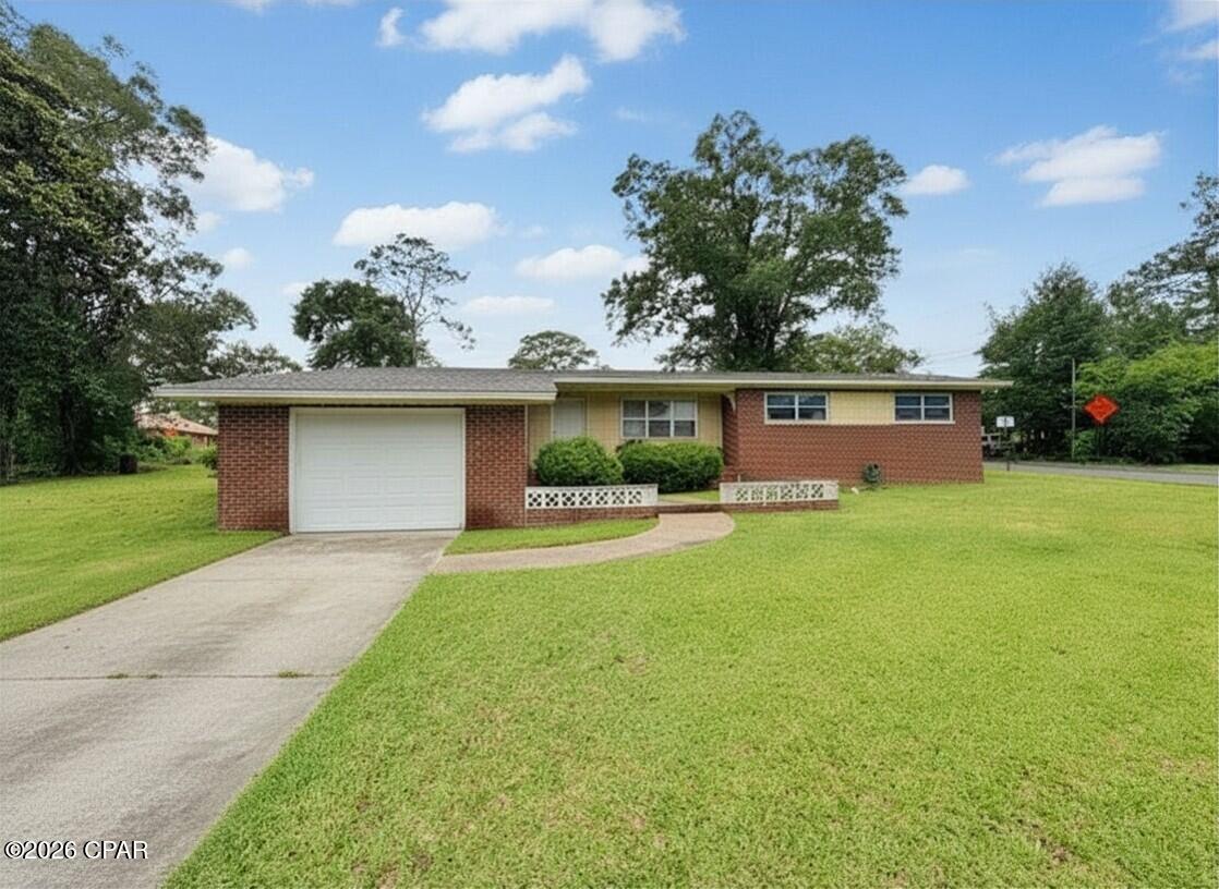 Charming Brick Home on a Spacious Corner Lot in the Heart of Bonifay!

Welcome home to this well-maintained 1,580+/- square foot brick residence situated on a generous corner lot in the charming community of Bonifay Florida. Offering solid construction, major system updates, and endless potential, this property is the perfect opportunity for buyers looking to create a home that reflects their own style and vision.

Step inside and discover a versatile semi-open floor plan designed for both comfortable everyday living and entertaining. The home features a welcoming formal living room accented by beautiful built-in wood bookcases, creating the perfect space for displaying treasured collections, family photos, or creating a cozy reading retreat.

Just beyond, you'll find a spacious family room conveniently located adjacent to the kitchen and dining area, allowing everyone to stay connected while preparing meals, hosting holiday gatherings, or enjoying game day with friends and family. The thoughtful semi-open layout offers the best of both worlds--defined living spaces with an open, inviting flow that today's buyers appreciate.

While the home is ready for cosmetic updates and personal touches, many of the major systems have already been updated, giving buyers confidence and peace of mind.

Outside, the spacious corner lot provides plenty of room for outdoor activities, gardening, entertaining, or simply relaxing under the Florida sunshine. The property's established setting and mature surroundings add to its timeless appeal and curb appeal.

You will enjoy easy access to major highways. Plus, the stunning beaches of Florida's Emerald Coast are just a scenic drive away, making weekend getaways a breeze.

Whether you're a first-time buyer, growing family, retiree, or investor, this home presents a fantastic opportunity to own a solid brick residence with major updates already completed. All that's missing is your personal touch to make it truly shine.

Don't miss your chance to own this charming Bonifay property--schedule your private showing today and imagine the possibilities!

*Please note Virtual staging and editing has been used to highlight features of the property