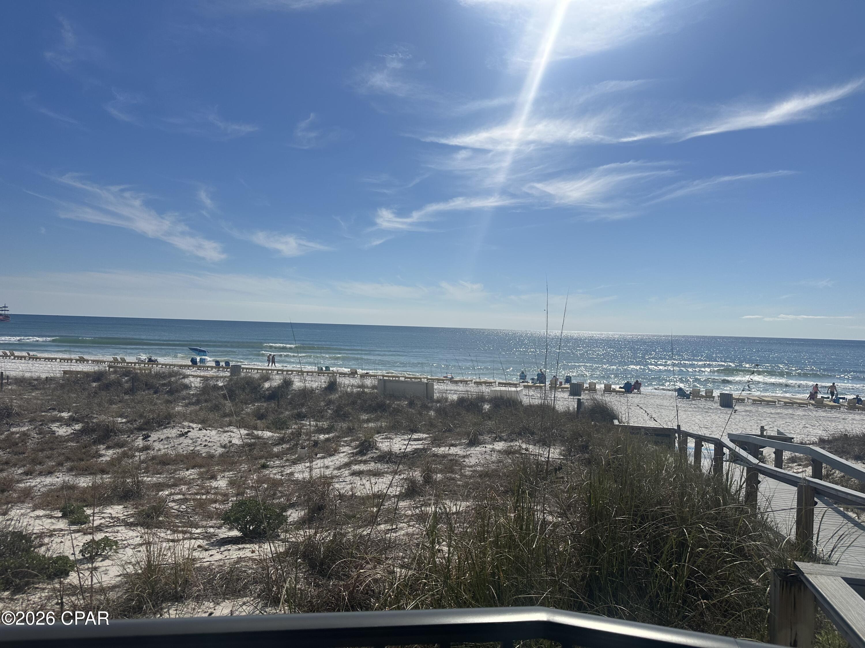 Gulf-front investment opportunity in Panama City Beach! This studio condo at 4715 Thomas Drive E-2 offers direct beach access and short-term rental potential in one of Florida's top vacation markets. Ideal for Airbnb or a personal getaway that generates income, with similar units producing ~$20K-$35K+ annually depending on usage and management. Located on the quieter east end near St. Andrews State Park, yet close to dining and attractions. Affordable beachfront ownership with strong upside--don't miss it!