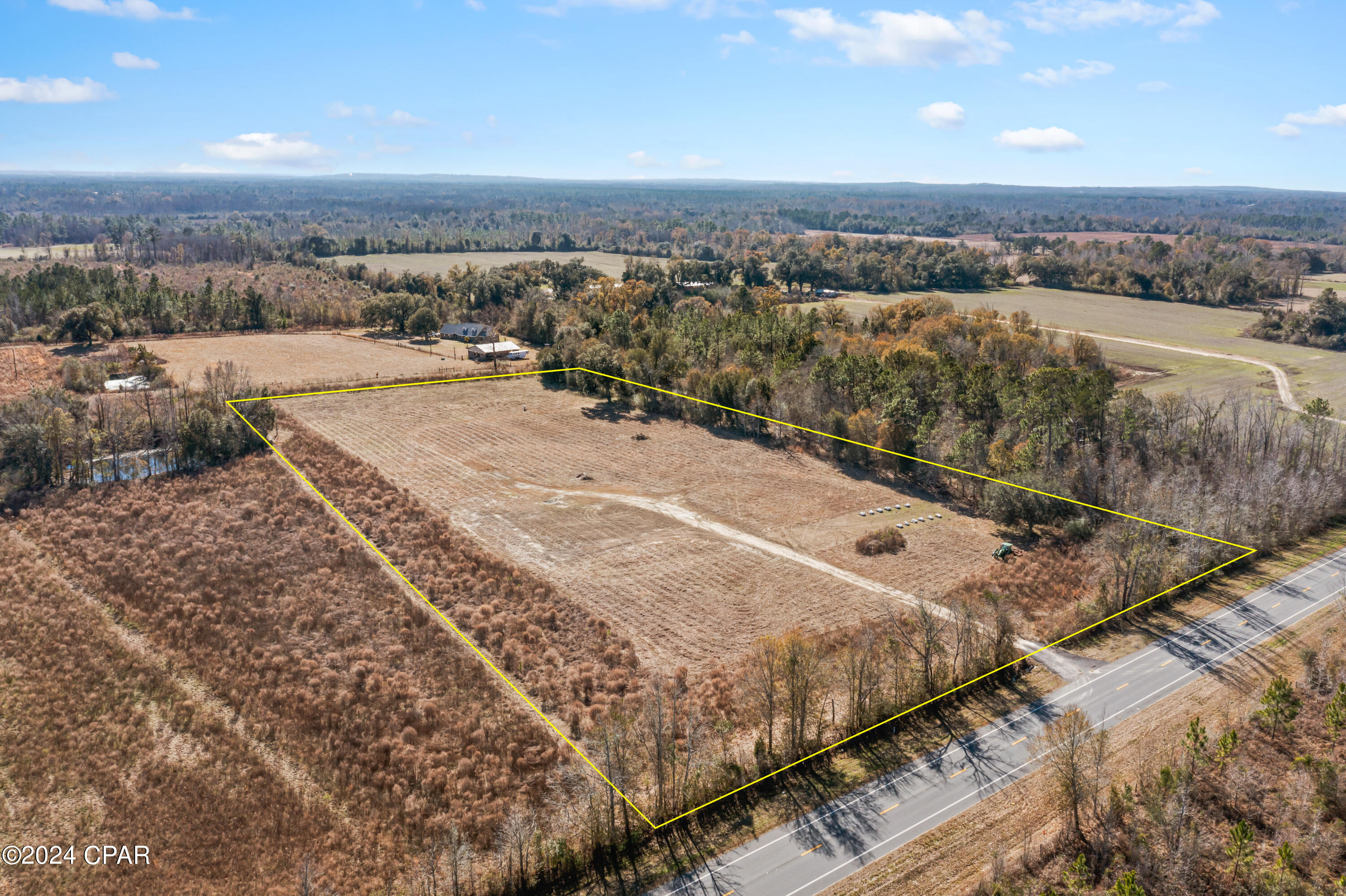Unleash your imagination on this pristine canvas of 8.3 acres, ready to transform your dreams into reality. Conveniently located between Chipley and Cottondale, this land combines the allure of rural living with the convenient access to nearby cities and interstate 10.  Most of the essential infrastructure has been taken care of by the current seller including, well, power pole and driveway.