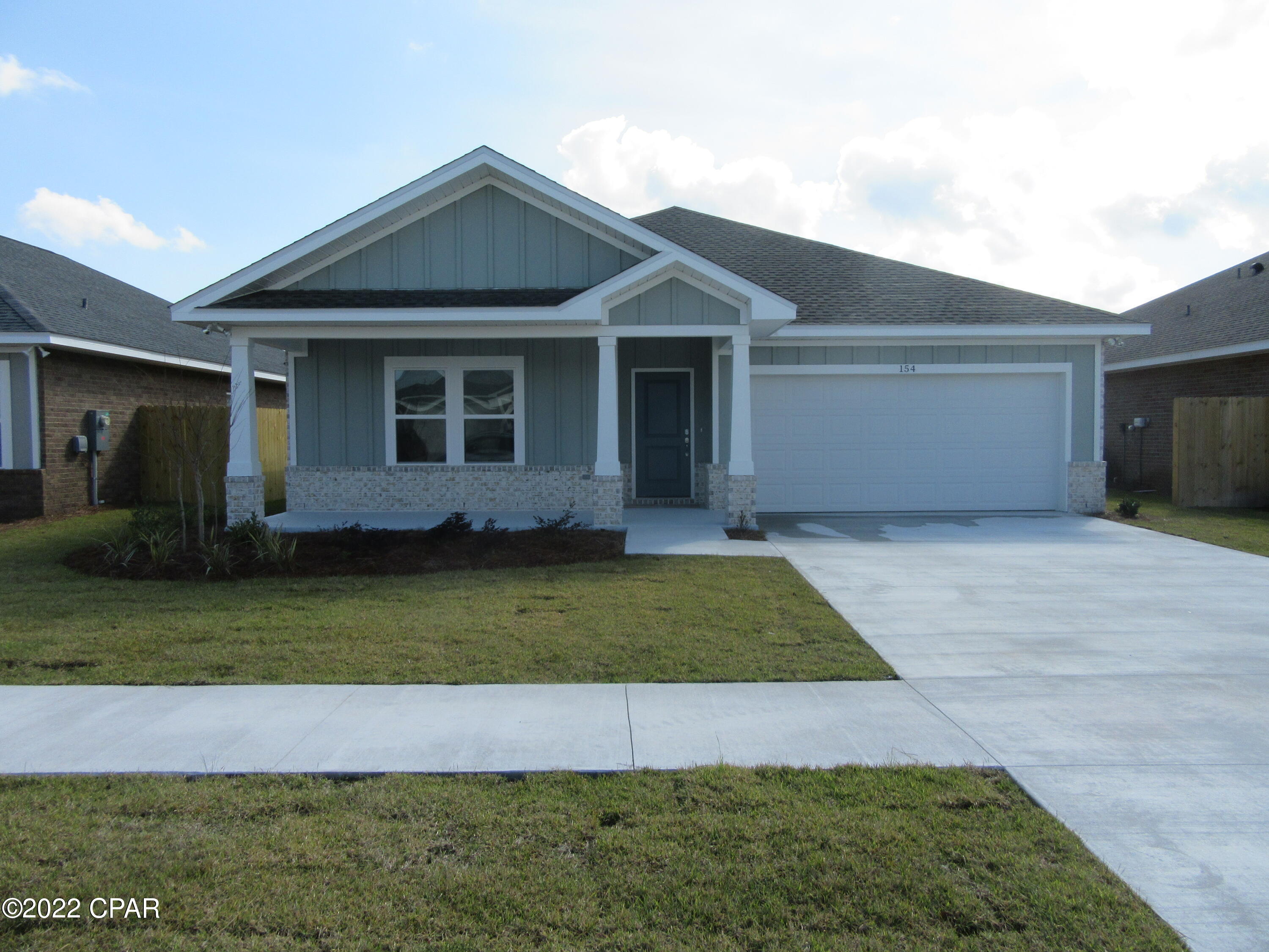 Located in the much desired community of Lynn Haven on the newly developed private community of Camryn's Crossing, this beautiful like new 3 bedroom 2 bath home is convenient to shopping, dining, schools, and centrally located to the Worlds Most Beautiful Beaches and Military Installations. Amenities include but not limited to new vinyl wood plank flooring, new paint, trim, upgraded fixtures, custom counter tops, cabinets, and stainless appliances, impending fenced in backyard. This property has an large 2 car garage. Living area is a very large open space with an island wet bar for entertaining. Community walking park and playground. All property sizes and ages are approximate, please measure and/or verify if important. School assignments are subject to change, please check with Bay County for most accurate information. Deposit is the same as the rent. Pet's allowed with breed restrictions and owner approval.