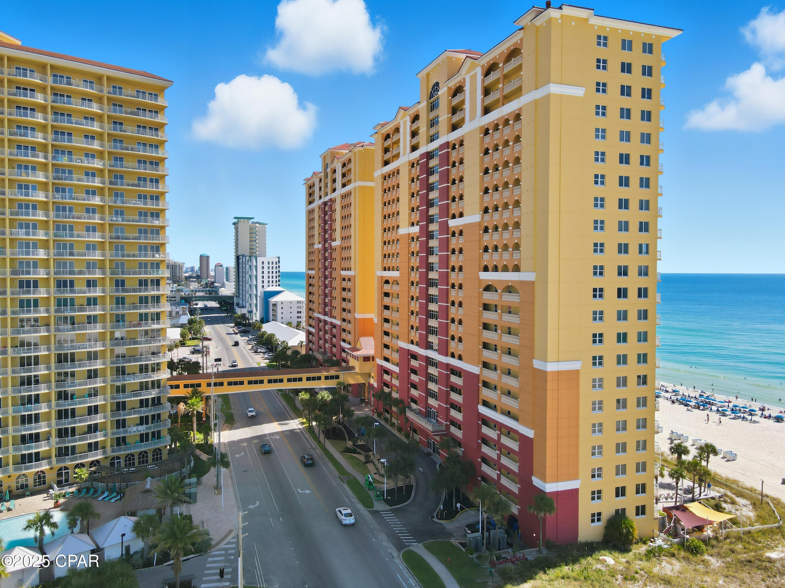 This is beach living at its finest. Located on the 19th floor of the sought-after Calypso Resort, this beautifully renovated condo offers jaw-dropping views of the Gulf of Mexico and the iconic sugar-white sands of Panama City Beach. From sunrise to sunset, the scenery is nothing short of spectacular.

Inside, you'll find a fresh coastal makeover with new paint, new appliances, and stylish new furnishings throughout. The spacious layout includes a large kitchen, a welcoming family room, a serene master suite and a private balcony that invites you to relax and soak in the views. The condo also features a washer and dryer in the unit, making everyday living or vacationing super convenient.

Offered fully furnished and decorated, this turnkey condo is ready for its next owner to plug in and start enjoying the beach life.
Calypso is the closest beachfront condo to Pier Park, placing you just steps from shopping, dining, and entertainment. You're also minutes from exciting new attractions like Top Golf, making this location perfect for both fun and relaxation.

Resort-style amenities include two sparkling pools, seasonal beach service, and an on-site rental desk. Whether you're looking for a second home, a vacation getaway, or a high-performing rental, this rare find checks all the boxes.