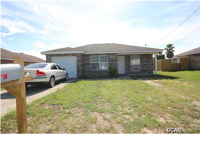 TWO HOUSES ON ONE LOT! These foreclosures are a great rental investment for the savvy investor looking for long term equity and cash flow. Don't miss out on this once in a life time deal in the heart of Panama City Beach. The homes are located near schools, shopping, and only a few blocks to the beach. You really can't go wrong with this opportunity to purchase TWO HOMES of this nature with endless combinations of potential use. Homes are being sold ''AS-IS''. You will not find a better investment in this price point in Panama City Beach. Thanks for viewing the listing!