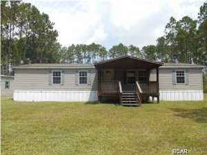 Here's your opportunity to own a lovely, large home, with a great big kitchen, complete with center island, perfect for the person who loves to cook. This home is located in Sandy Creek, just 15 minutes from Tyndall AFB and Panama City, with very few neighbors and tons of privacy. The master bedroom suite is complete with a 5 piece ensuite, including garding tub and separate shower. This home has 3 bedrooms, PLUS an additional study/sitting room or office. (Buyer to verify ANY info that is important, as all information provided is approximate and not guaranteed to be accurate.)