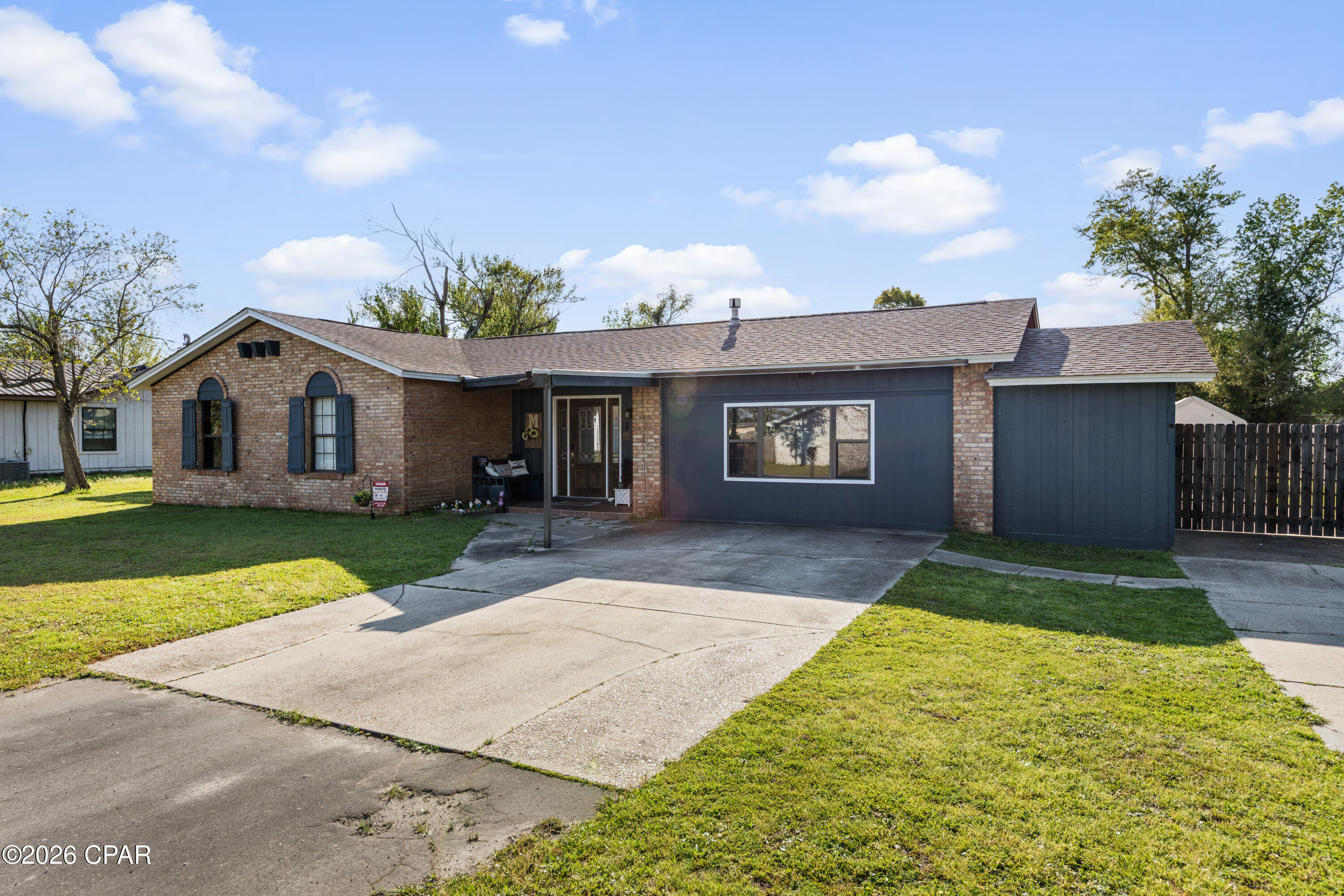 Move-in ready 3-bedroom, 2-bath home in Lynn Haven, ideally situated on a spacious 0.34-acre. This well-maintained property features a patio great for entertaining and enjoying the Florida lifestyle. Inside, you'll find a bright, open layout with generous natural light. The fully fenced backyard offers privacy and green space. No HOA and short-term rentals are permitted. Located just minutes from dining and shopping, this home delivers comfort, efficiency, and an unbeatable value in one of Bay County's most convenient neighborhoods.