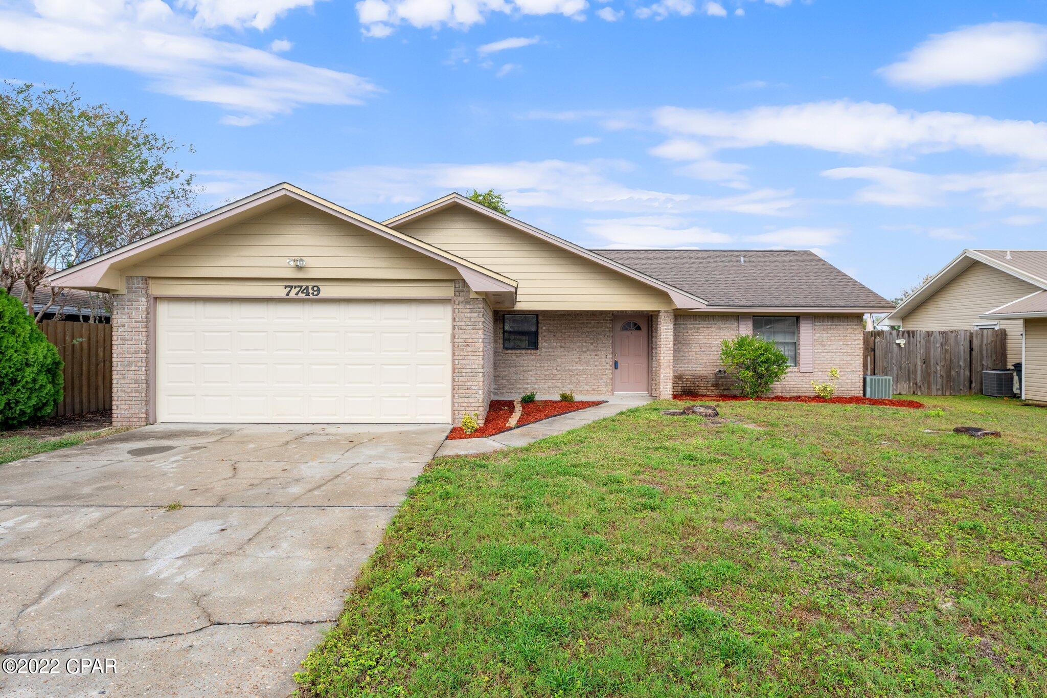A great opportunity to own a well-maintained home centrally located to TAFB. This home features 3 bedrooms and 2 bathrooms. The spacious kitchen has a breakfast bar attached and opens to the large family room. The family room features wood beam cathedral ceilings and a brick fireplace. The large patio door and picture window in the living room provide a lot of natural light throughout. The master bedroom has a large walk-in closet along with a sliding glass door that exits to the back patio. There are two additional bedrooms and a bathroom featuring a tub/shower combo. The interior has been recently painted, sliding glass doors were replaced in the living and master bedroom & the garage door was replaced in 2021. A new roof was installed in 2015, repaired after the hurricane and recently reinspected by the original roofer in October of 2022.