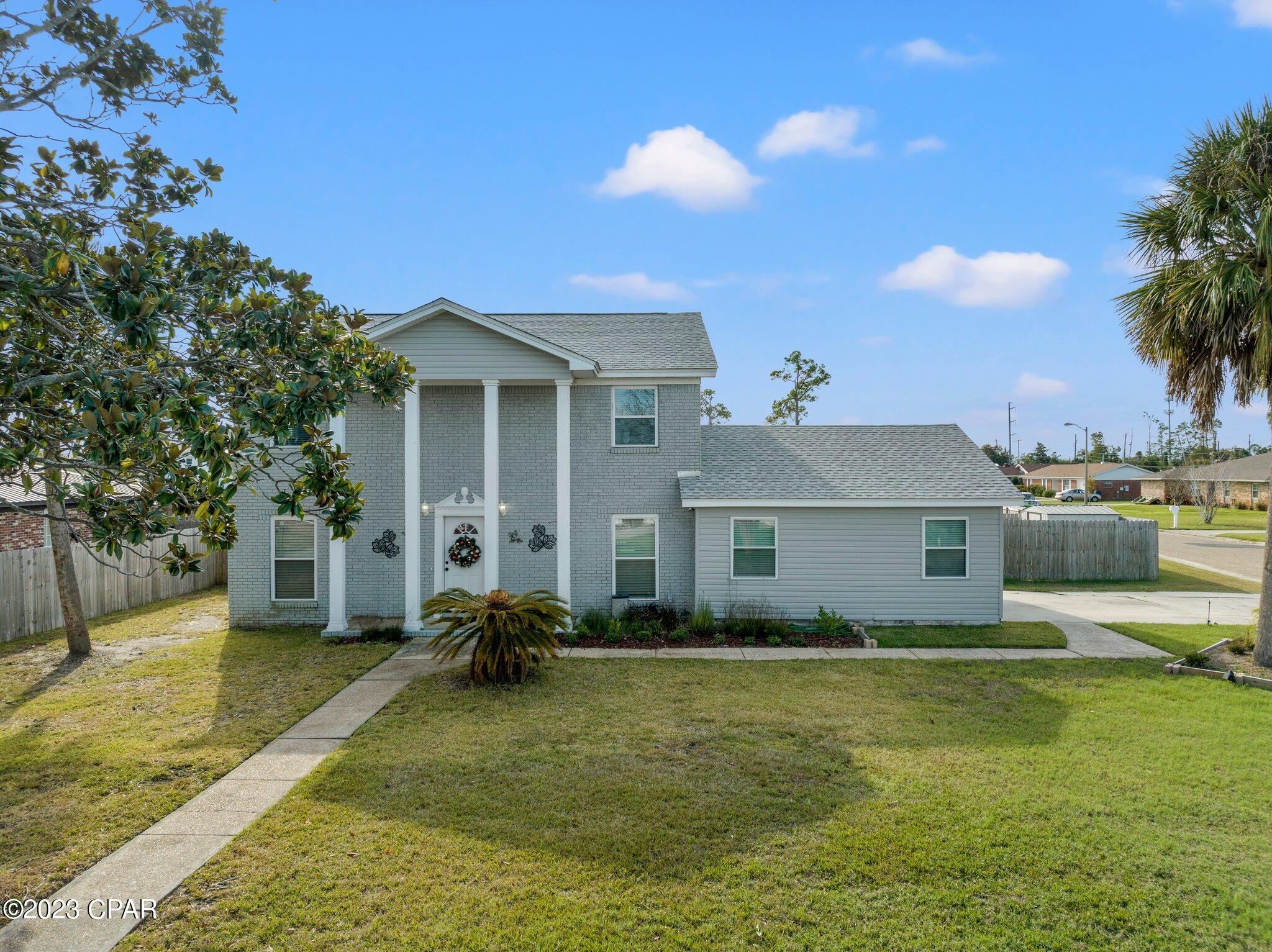 Priced to sell and move in ready!  If you have a large or growing family, you must check out this spacious, freshly renovated home in the quiet neighborhood of Meadowbrook Estates. With its split floor plan, this gorgeous two story house features a large primary Master Bed & Bath downstairs along with a perfect 1/2 bath for guests. Upstairs you will find 4 more Bedrooms and 2 full baths; one of them, a second master. The tastefully updated kitchen and bathrooms are equipped with Granite Countertops, Stainless Steel Appliances, and plenty of storage. In the fully fenced backyard, you will enjoy the covered patio, well established green lawn and a 6 ft. of privacy. Home is on a large corner lot, and has been extremely well kept. Located in the heart of Panama City, this home is convenient to schools, shopping, Panama City Beaches, and restaurants. Seller is willing to owner finance a lease to own option with a down payment for 24 months.