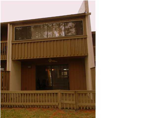 For rent. This unit is two stories with the living/dining room, kitchen, and half bathroom downstairs and the two bedrooms each with adjoining bathroom upstairs. The large master bedroom overlooks the lagoon, has double closets with mirrored sliding doors and an attached master bathroom. Down the hall is another bedroom with double closets and an attached bathroom. The patio overlooks Grand Lagoon and is the perfect spot for grilling out! Small pet under 24lbs negotiable with non-refundable pet fee. Cable, water/sewer, garbage, and pest control included. Complex amenities include lagoon front pool and dock.