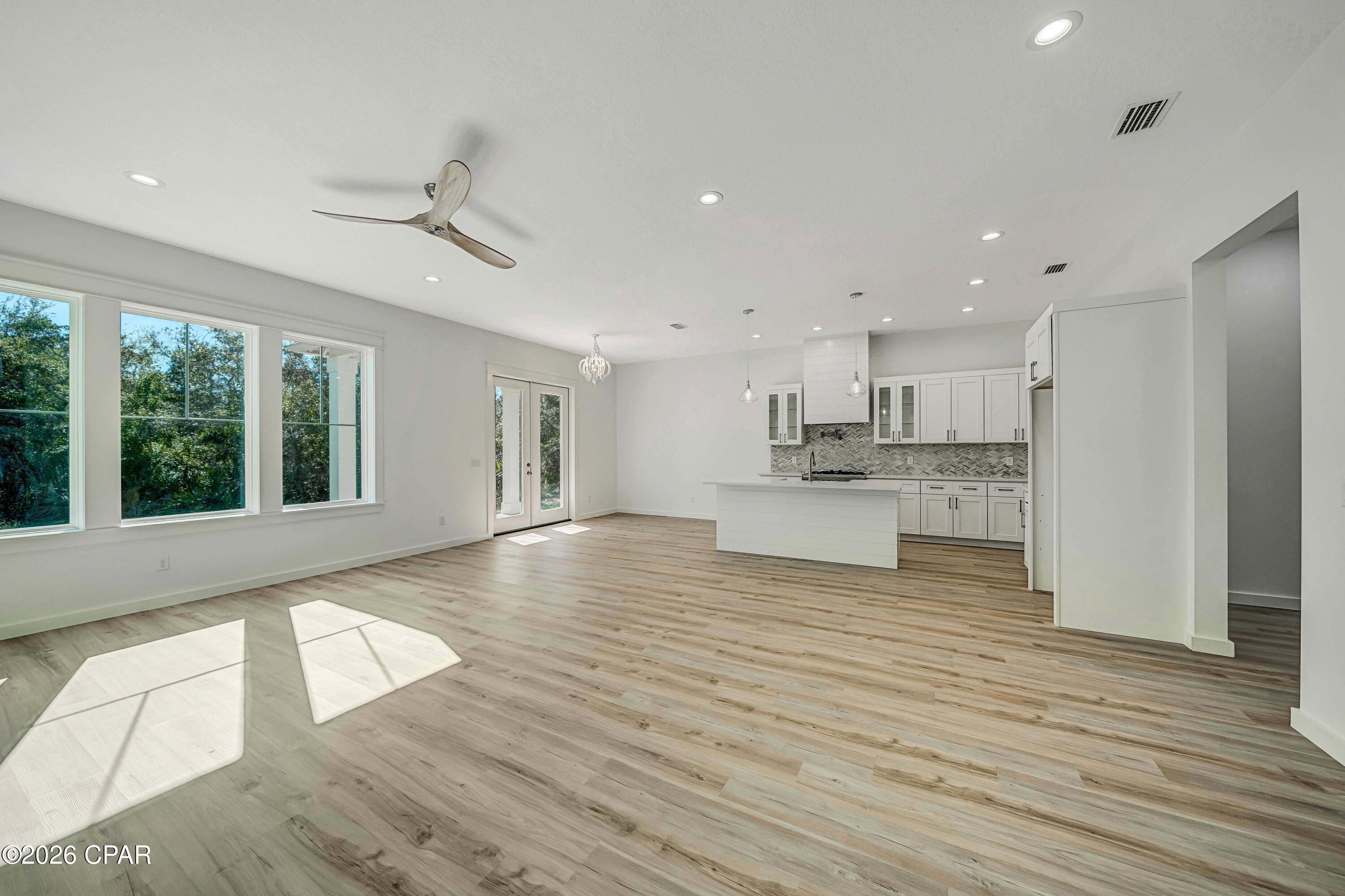 4 bedroom, 2 1/2 bath new construction home in the quiet, serene, gated community of Sanctuary Beach. Conveniently located steps from St Andrews Bay, close to Bay Point Golf Club and the area's largest marinas serving access to the Gulf, the Naval Dive School (NSA), shopping and fine dining. Location, location, location! This 2340 sq ft home has the desired open kitchen, dining and living area perfect for entertaining and all located on the main floor of the home. There are 10-foot ceilings and durable, low maintenance wood-look LVP flooring along with the convenience of a 1/2 bath. The kitchen has a large Butler pantry, quartz counter tops, gas stove top with a pot filler, ship lapped island and exhaust hood. Upstairs you will find the 4 bedrooms and 2 full baths, both with double vanities. There is also bonus/flex space of over 130 sq. ft. that separates the master suite from the other bedrooms. Master bath has a beautiful large, tiled shower and a walk-in closet. Finally, there is a 2-car garage consisting of over 422 sq. ft. No neighbors behind the home add to the peace and quiet offered by the neighborhood.
Sanctuary Beach has a community pool and a trail that leads to the shores of St Andrews Bay. It is conveniently located next to all that Panama City Beach has to offer yet is quietly tucked away from the crowds and traffic.
Home is empty and easy to show!
