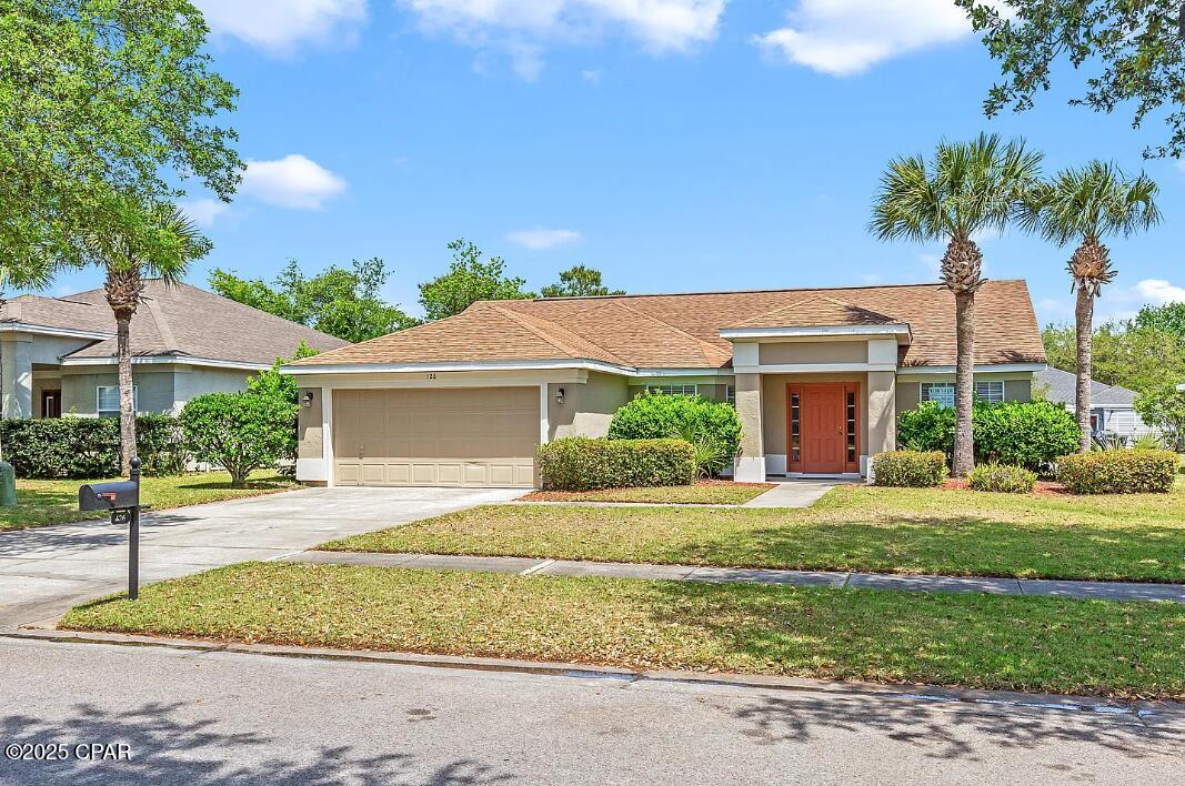 Located in the private and peaceful Palmetto Trace neighborhood, this beautifully remodeled 3-bedroom, 2-bathroom home offers 1,576 square feet of modern style and comfort.

The fully renovated kitchen features brand-new cabinetry, a farmhouse-style sink, and a stunning granite island--perfect for entertaining. The spacious living area seamlessly combines dining and relaxation, with new ceiling fans and remote controls for added convenience.

The master suite provides a serene retreat with double vanities, a walk-in shower, and a large walk-in closet. Two additional bedrooms are positioned for privacy, making this home ideal for families or hosting guests.

Enjoy one of the largest fenced yards in the neighborhood--perfect for gatherings, gardening, or pets. The two-car garage and spacious driveway offer ample parking for up to four vehicles.

Residents of Palmetto Trace have access to two sparkling community pools and are just one mile from world-renowned beaches. Nearby attractions include Pier Park, Aaron Bessant Park, and Frank Brown Park, offering endless options for recreation and entertainment.

Additional highlights include energy-efficient appliances, abundant natural light, and modern finishes throughout. Schedule your viewing today and make 126 Covington your new home.