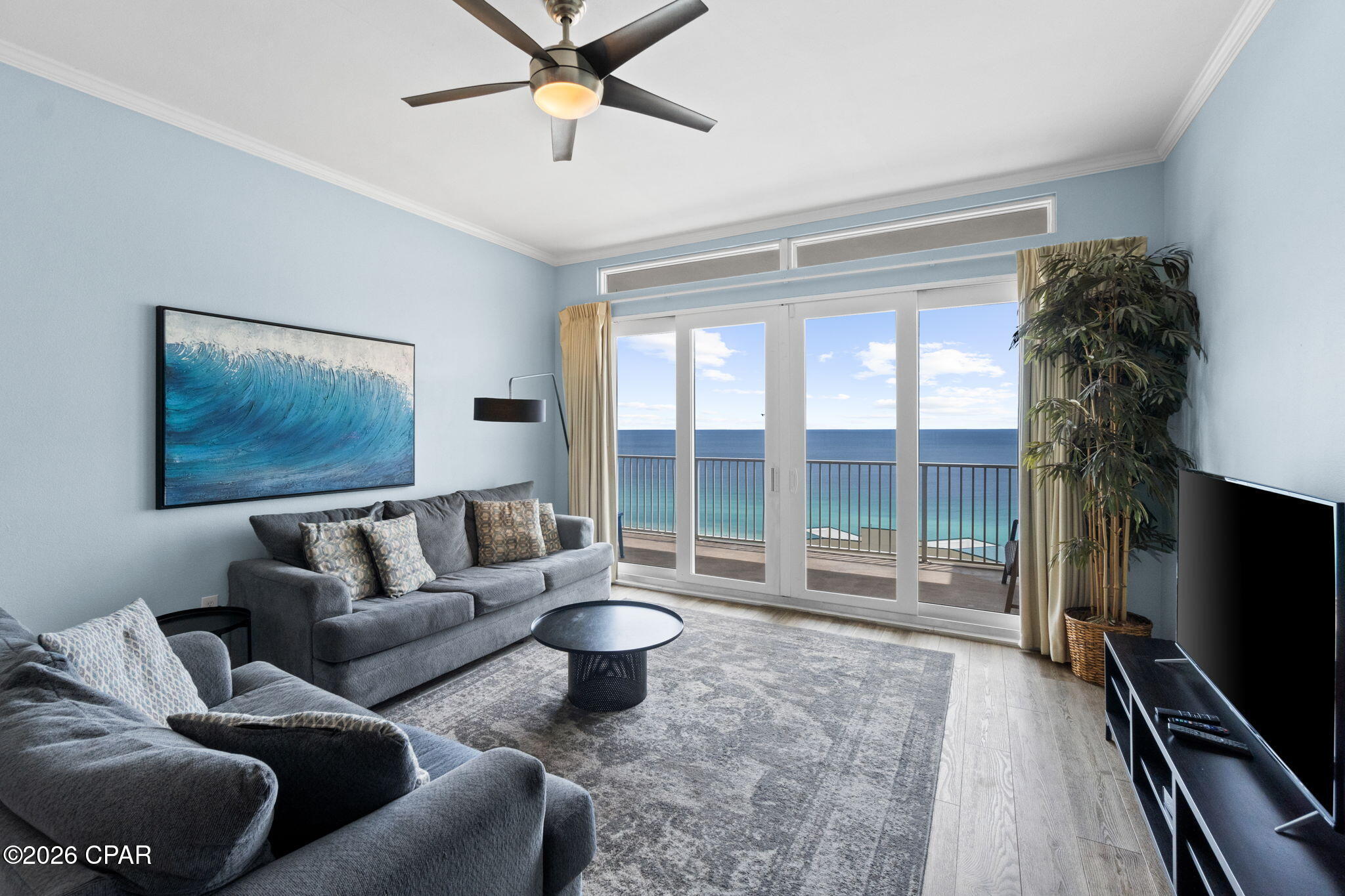 Experience penthouse living at Laketown Wharf in this beautifully appointed 2-bedroom, 2-bath condo with a bonus bunk room. Located on the top floor, Unit 2111 offers 1,262 square feet of open-concept living, floor-to-ceiling windows, a modern kitchen with granite countertops, and a private balcony showcasing panoramic Gulf views. Enjoy private beach access and outstanding resort amenities in the heart of Panama City Beach.