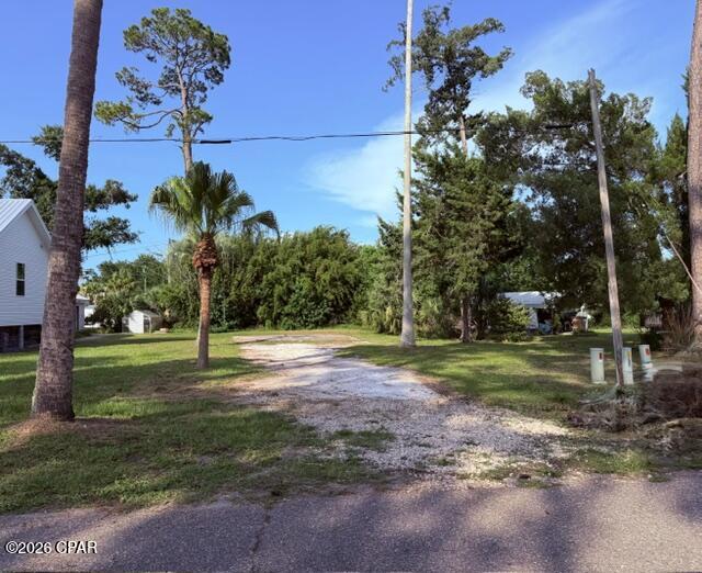 This cleared lot is nestled in the charming coastal community of Port St. Joe. It is a short walk, less than 1/2 mile to the Bay and a 10-minute drive to the sugar white sandy beaches. Schools are 4 blocks away, 3 miles from the hospital and 1 mile to Reid Avenue downtown with many dining options and specialty shops. There is also a Park and a 3 par golf course one block from lot. Tap fee due.