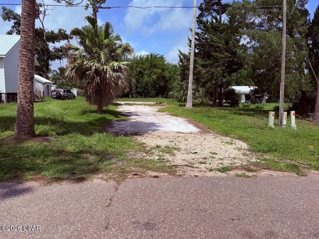 This cleared lot is nestled in the charming coastal community of Port St. Joe. It is a short walk, less than 1/2 mile to the Bay and a 10-minute drive to the sugar white sandy beaches. Schools are 4 blocks away, 3 miles from the hospital and 1 mile to Reid Avenue downtown with many dining options and specialty shops. There is also a Park and a 3 par golf course one block from lot. Tap fee due.