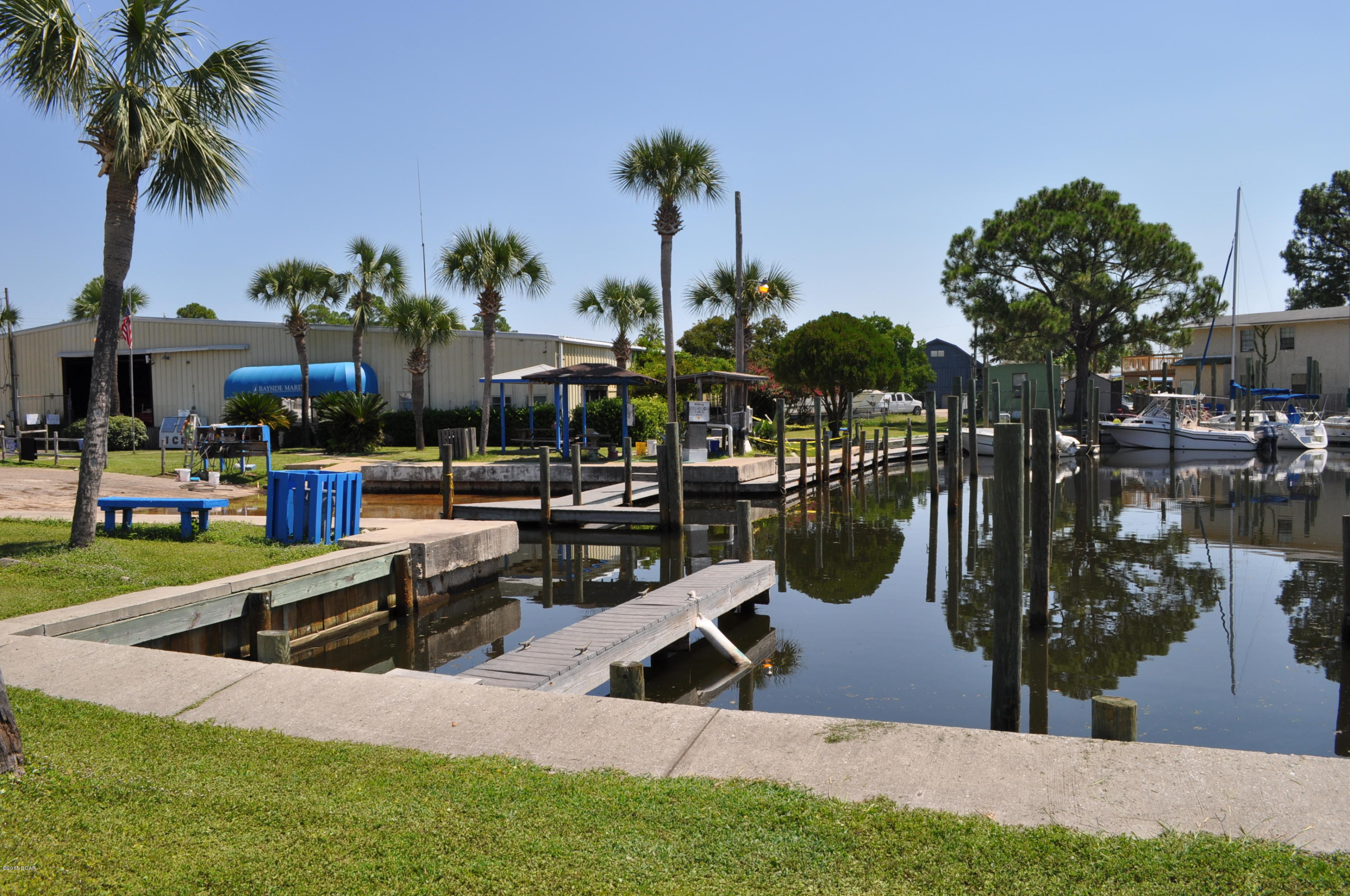 Perfect, low-maintenance weekend retreat for a boat owner!  You're right next to a marina and a canal with bay and gulf access!  This 1BR/1BA mobile home is neat-as-a-pin and move-in ready.  Roof and water heater were replaced in 2014, the appliances are recent upgrades and the seller says her power bills are quite low.  Quiet, tucked away neighborhood, but you're still within 5 minutes of shopping, restaurants and more!  All info is approx. and must be verified by Buyers if important.