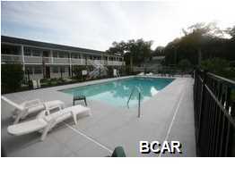 This fully furnished 2 bedroom 1 bath condo is on the second floor and has an open back deck for watching sunsets or events from the comfort of your condo! This 'tropical' environment is both fun and comfortable! You can enjoy the welcoming picnic area and clubhouse as well as the Marina, Oaks by the Bay Park and all the shops on Beck Avenue. St. Andrews also holds many festivals and events in the area such as concerts at the park, Mardi Gras, Boat parades and much more! Don't miss this rare opportunity! *All measurements are approximate.