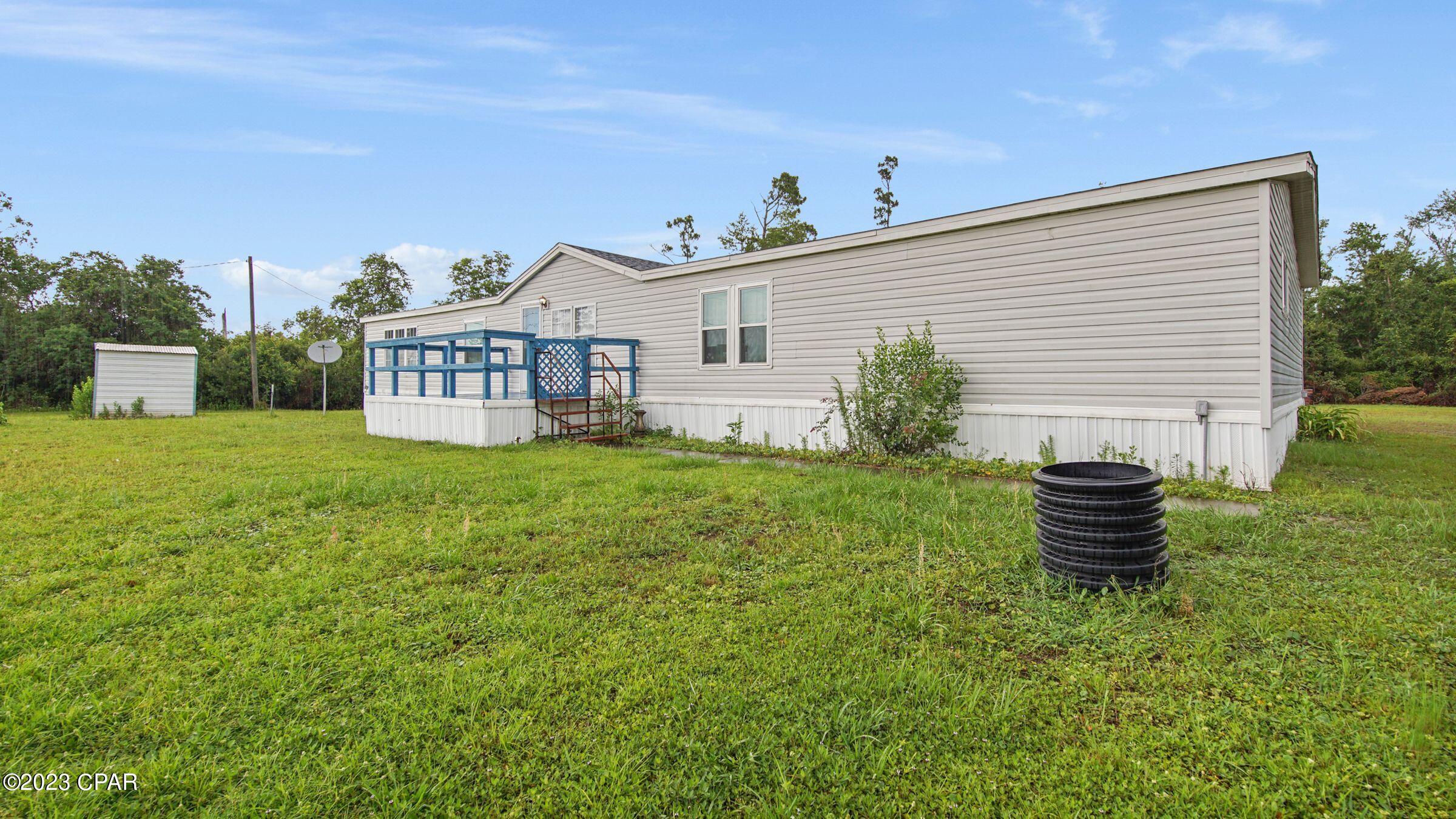 CURRENTLY UNDER CONTRACT, SELLER WILL CONSIDER BACKUP OFFERS' 

Country living close to town! This beautiful 2 acre, 4 bedroom, 2 1/2 bath, over 2300 sq ft property has been given a facelift and is ready for the next owner. Updates include, brand new AquaPro water system, updated electrical in the pump house, lift station, and pole barn. Primary bathroom is currently being redone with new floors, shower insert, and vanity, to be completed end of May. Debris has been removed and property line cleared and pushed back. Large Workshop has plenty of space for all your hobbies and a garage door for automotive work. RV pole is available, just needs electrical connected. Remote gate protects entry and there is an additional fenced in area out back for pets.