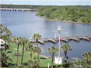 The owner has just done some changes to the unit consisting of all new kitchen appliances, new carpet, and is having paint work and touch up done. There are Beautiful views from this desirable Pinnacle Port Unit, both bedrooms and the living room offer views of the Gulf or of Lake Powell and the Pinnacle Port Marina. This complex offer numerous amenities and is conveniently located to Pier Park, North West Florida Beaches Airport, some Great Golf Courses and 30A. You will be less than thirty minutes from a host of restaurants and shopping areas. Make your appointment today and see what it would be like to be able to play in the Gulf or Fish in Lake Powell.