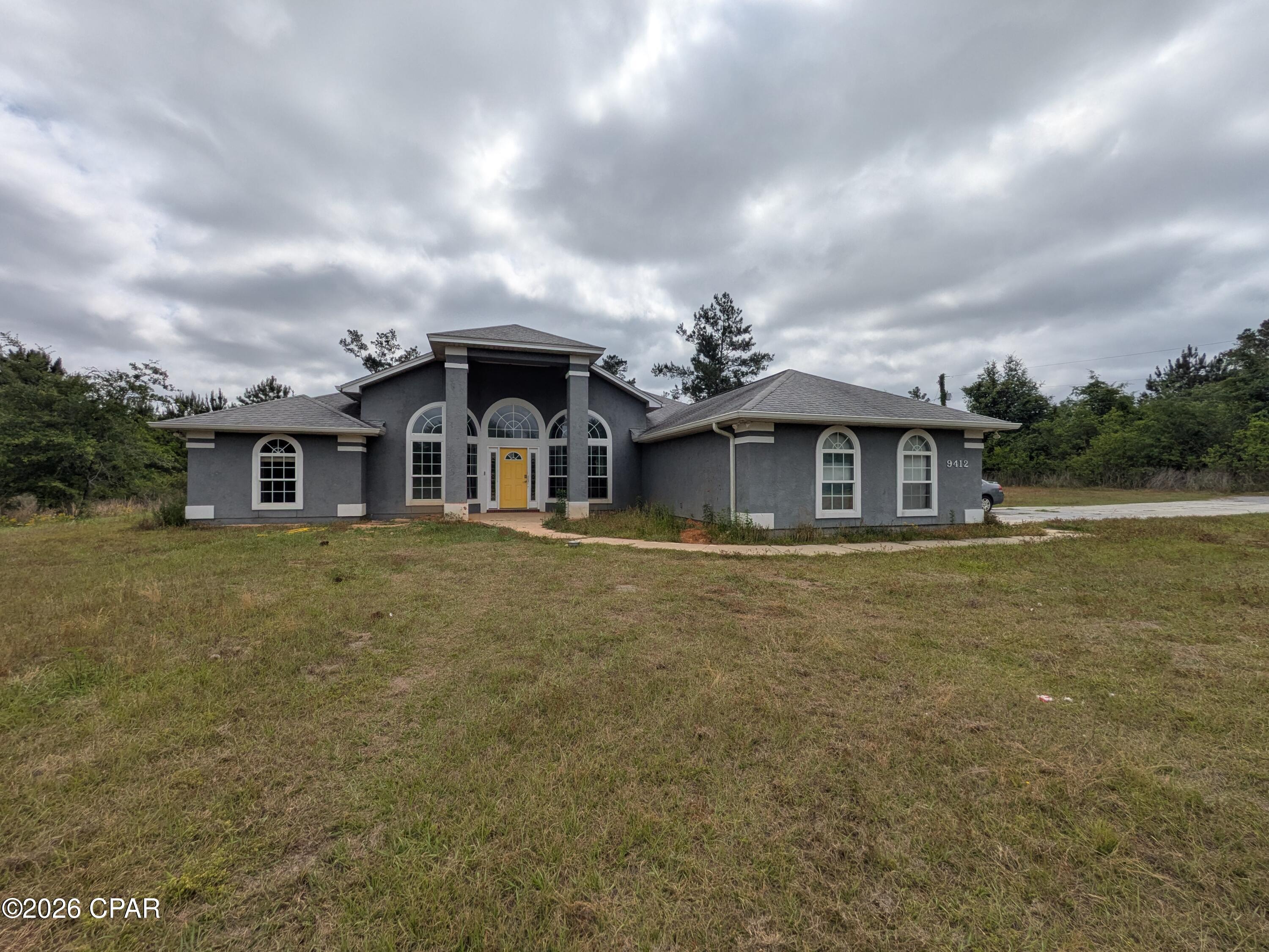 Investor Alert and Amazing Potential! Great deal on this fantastic 10 acre estate with large modern construction home fully remodeled in 2021.  An extra large 2 stall garage and room for pole barns and storage for all your toys.

This home requires some minor interior and exterior maintenance, a perfect time to make this yours with the yard of your dreams! A powerwash on the exterior will brighten it up quickly.  The air conditioning (2006) requires maintenance or replacement. 2020 Roof, 2021 Water Heater. 

Interior is in great condition, all kitchen appliances in working order and included. Wonderful sky high ceilings, split bedroom floor plan, and large kitchen with granite countertops overlooking the living area with large gorgeous fireplace complete with custom built in shelving and cabinets. Tile and laminate flooring throughout for low maintenance living and longevity. 

Large main suite features private back patio entrance, walk-in closet, dual vanity with granite countertops, soaker jet tub, and a separate walk-in shower. 

Rear screened and covered patio for watching nature and rain, with access to guest bathroom! Perfect place to put your pool or enlarged patio.

Pictures are current. Sellers in process of moving.