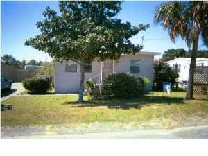 This cute beach cottage is on the lake. Nice deck with detached storage building. This home is 2 bedroom 1 bath and very nicely kept. This home has character. Move in ready. Check photos. Small pets negotiable.