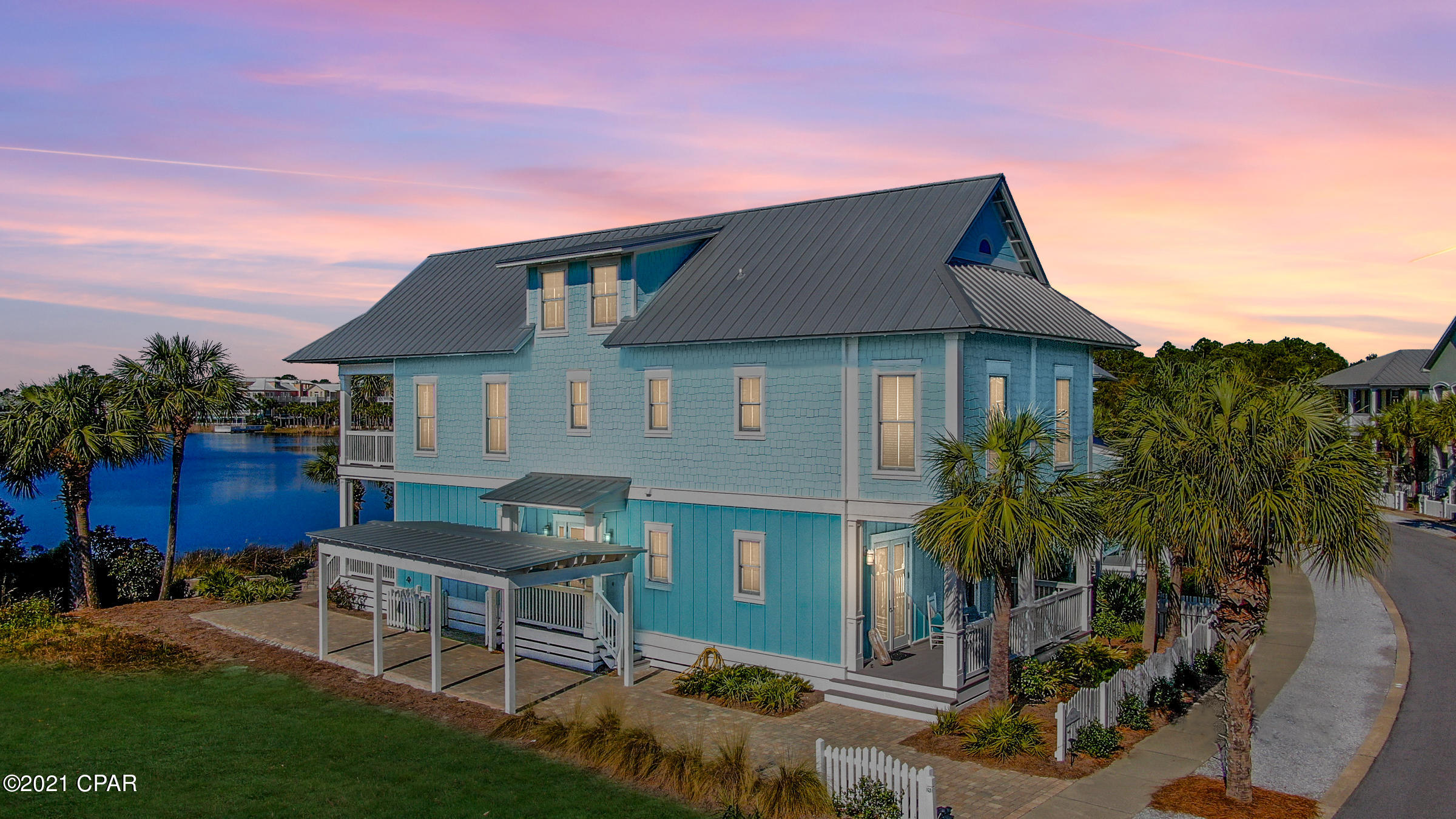 CURRENTLY UNDER CONTRACT, SELLER ACCEPTING BACKUP OFFERS' Over $110k in rentals on the books for 2021 already!! Welcome to Our Fanta-Sea!! If you are looking for a golf cart and pedestrian friendly, yet quiet community, look no further. This Spectacular Lakefront 6 Bedroom 6.5 Bath Carillon Beach Home is Just a Short Walk to the Pristine Waters of the Gulf of Mexico. This Property is rental ready and is a proven and incredible income generating investment property but would also make The Perfect Full-time Residence. Wonderfully Updated and Professionally decorated. This home has five bedrooms, each with its own bathroom and an entire third floor dedicated to kids and teens with a large living/play area, full bath and a bunk area with twelve double bunks!! Two guest bedrooms and the master suite make up the first floor. Off the master bedroom, there is a huge back deck with a relaxing view of Lake Carillon and a sitting area with a decorative fire pit perfect for outdoor entertaining and enjoying evening sunsets. Take the stairs or elevator to the second floor where you find a bright and Open Floor Plan, Breakfast bar, A Gourmet Kitchen with Upgraded Stainless-steel Appliances, Granite Countertops, a Stylish Stainless Farmhouse Sink and Plenty of Cabinet and Counter Space. The living and dining areas offer a bright, friendly and comfortable space to relax, enjoy the views and company of family and friends. Two additional guest rooms and laundry are also on the second floor. In addition, there are not one, but two sets of washers and dryers and two dishwashers. Our Fanta-Sea is Situated next to the East Pool on the banks of Lake Carillon. Take Deeded access (#7) to a one mile stretch of sugar white sandy beach and emerald waters of the Gulf of Mexico. Amenities include Carillon Bell Tower, Lake Carillon, The Beach Pool Club, Lake Carillon Pool a/k/a East Pool, Bellview Park and Pool, Carillon Downtown and Market Street, The Meeting House, Beach Walkovers and Pavillons. And that is just the beginning. Carillon Beach community offers the best of both worlds being located on the west end of Panama City Beach and just minutes from 30a shopping and dining. All measurements, ages and room sizes are approximate. Buyer should verify if important.
